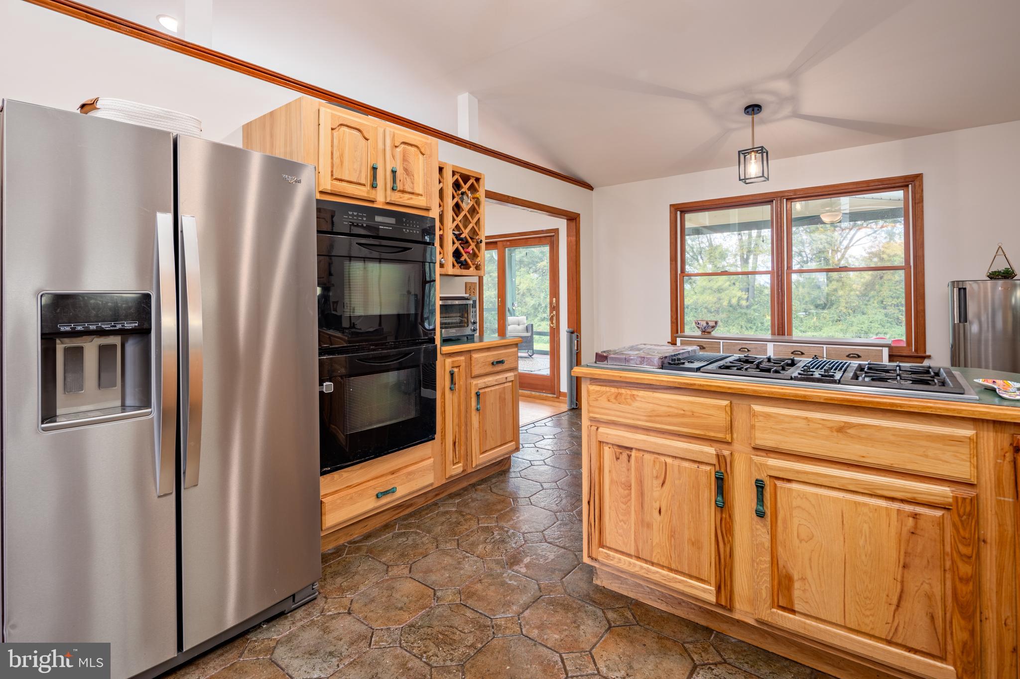 15902 Trenton Road Upperco, MD 21155 - Photo 17 of 57 a kitchen with stainless steel appliances a refrigerator and a sink