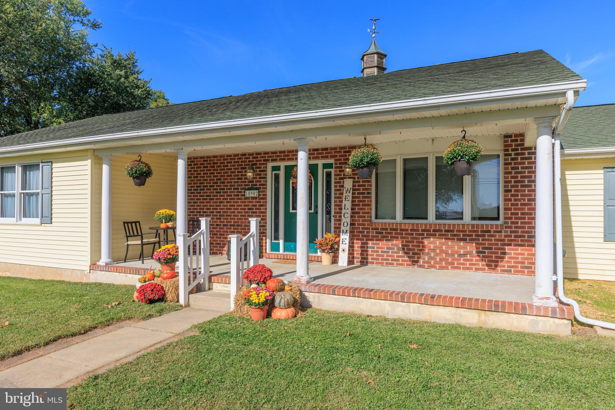 15902 Trenton Road Upperco, MD 21155 - Photo 2 of 57 a front view of a house with a yard outdoor seating and garage