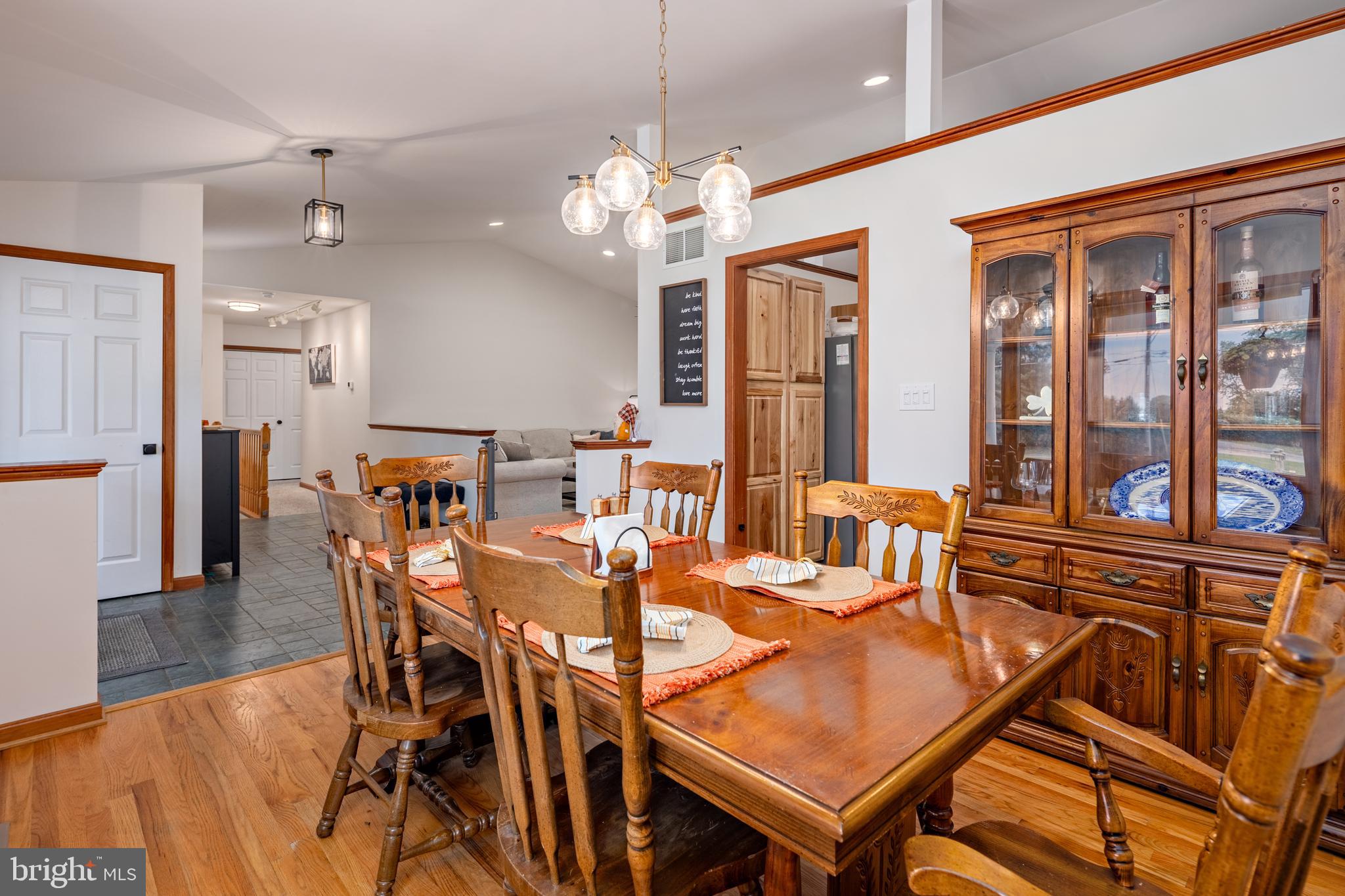 15902 Trenton Road Upperco, MD 21155 - Photo 22 of 57 a view of a dining room with furniture window and wooden floor