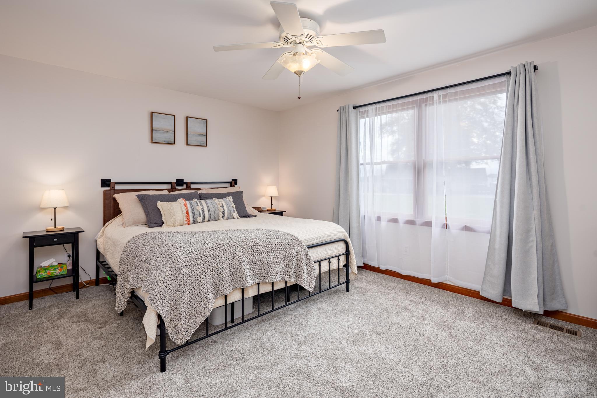 15902 Trenton Road Upperco, MD 21155 - Photo 29 of 57 a spacious bedroom with a bed and a window