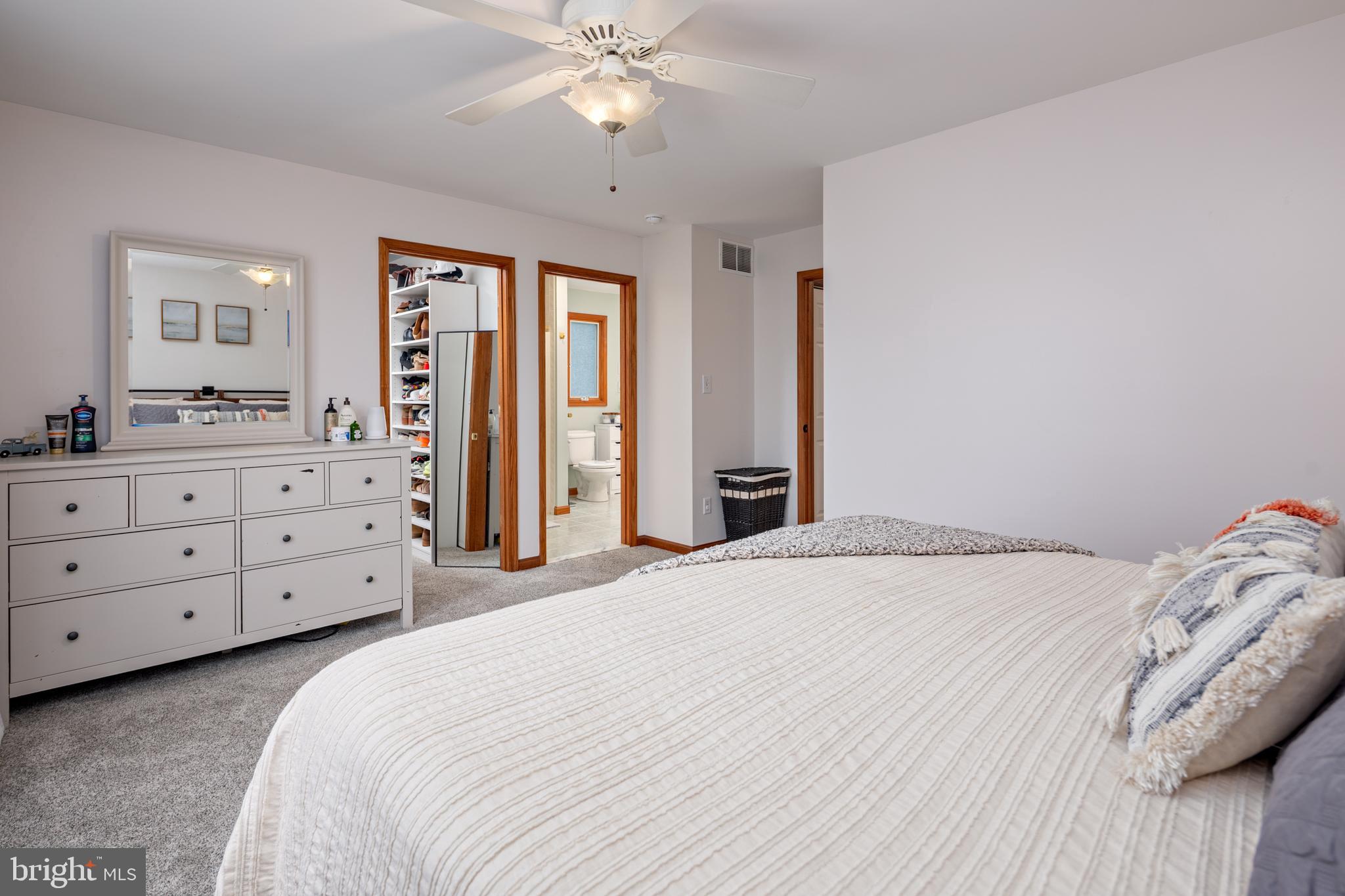 15902 Trenton Road Upperco, MD 21155 - Photo 31 of 57 a bedroom with a bed and a dresser