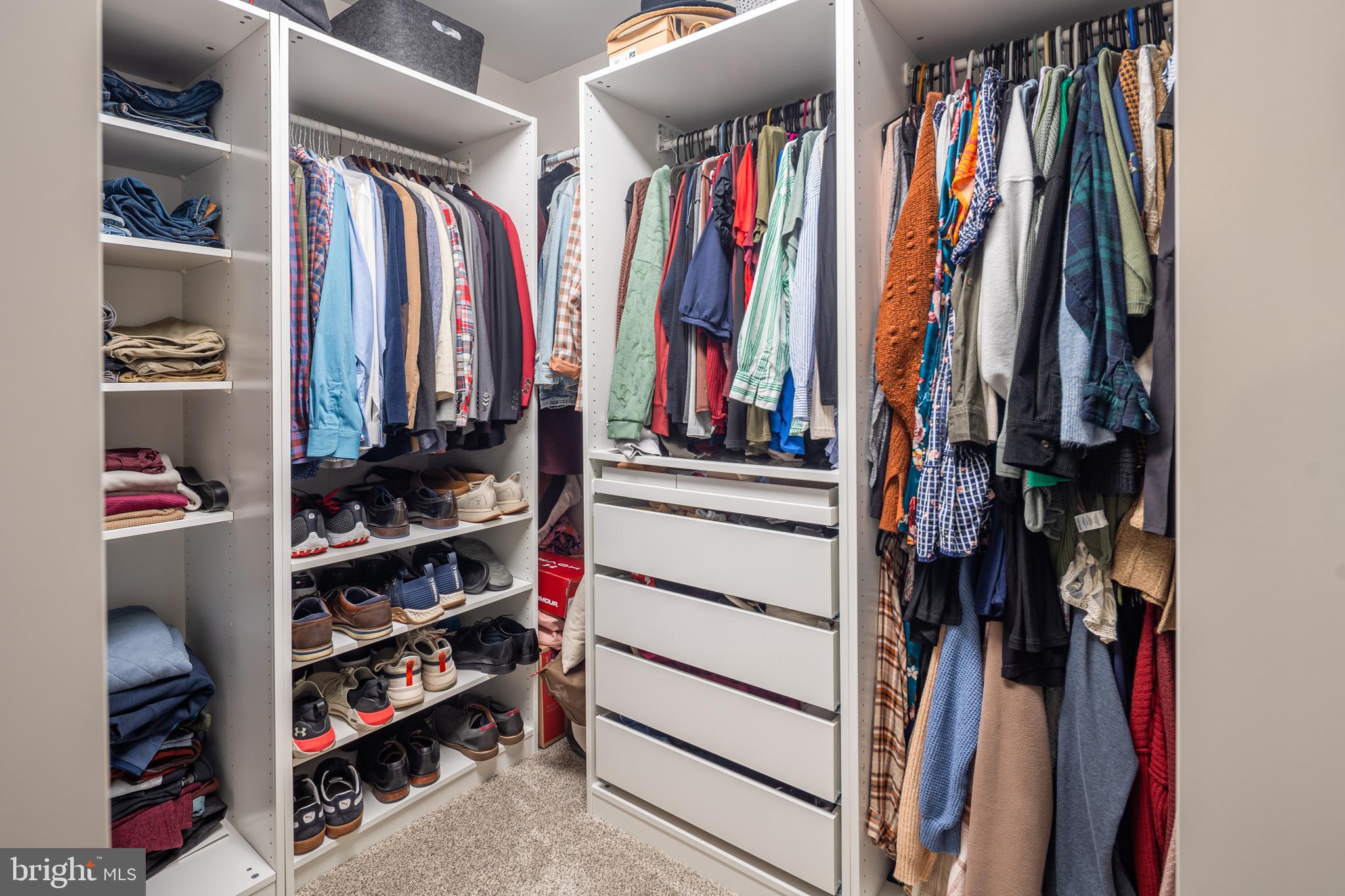 15902 Trenton Road Upperco, MD 21155 - Photo 34 of 57 a view of walk in closet with clothes and shoes