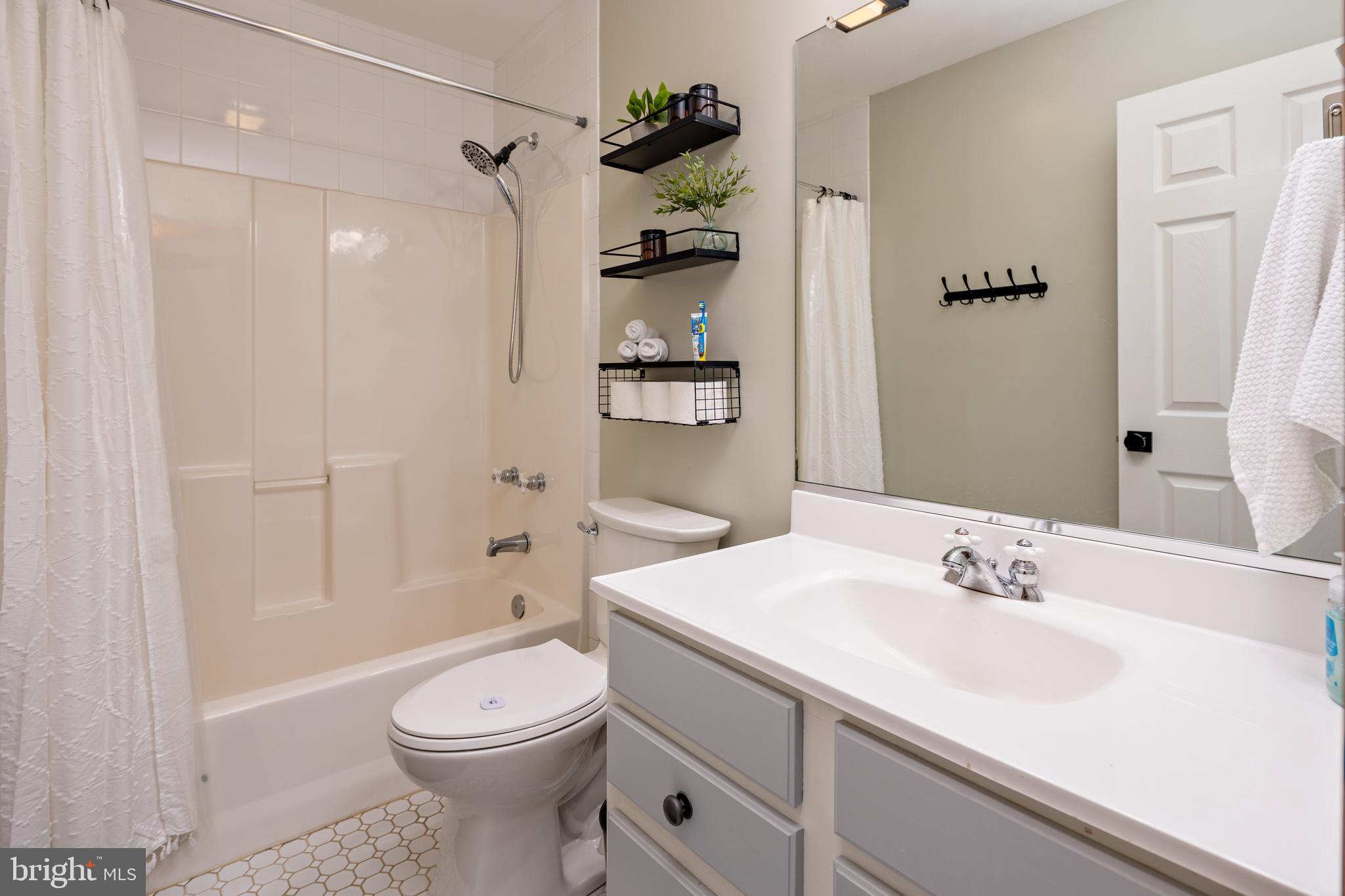 15902 Trenton Road Upperco, MD 21155 - Photo 37 of 57 a bathroom with a sink a toilet and shower