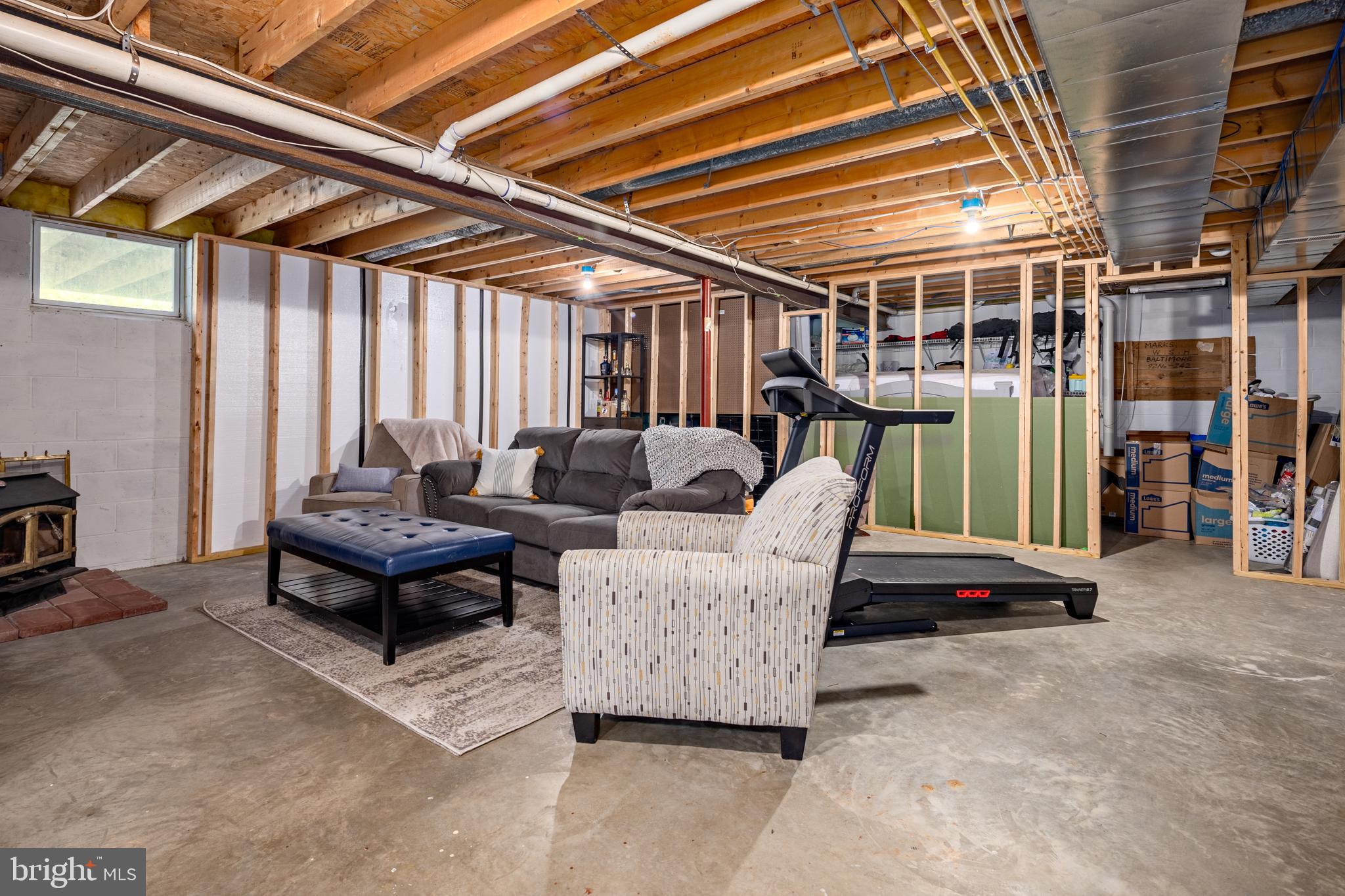15902 Trenton Road Upperco, MD 21155 - Photo 39 of 57 a living room with furniture and a chandelier