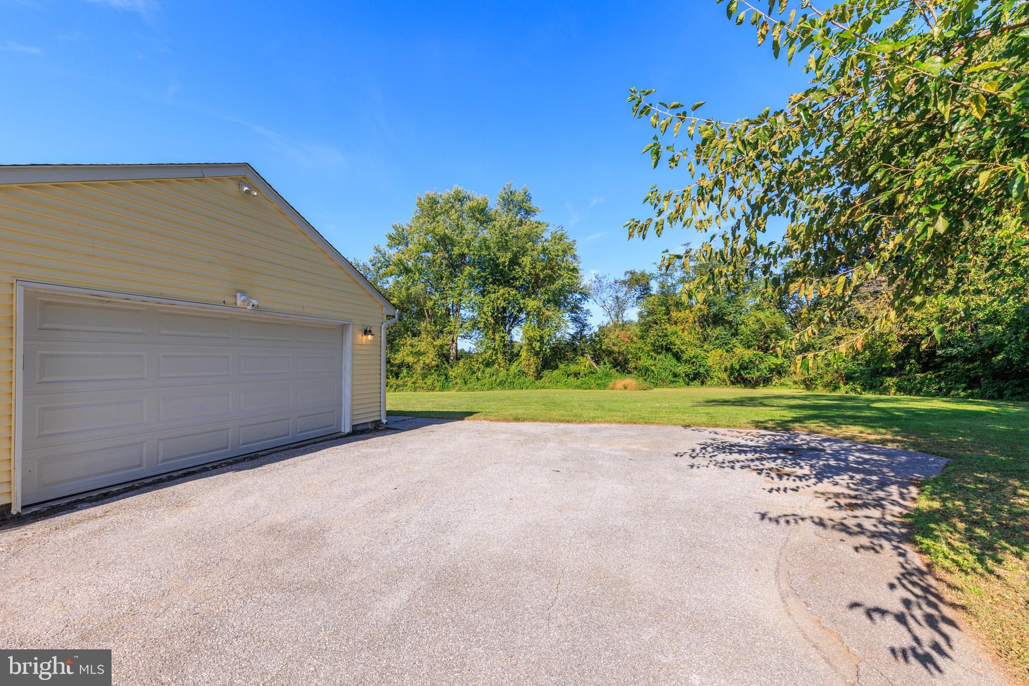 15902 Trenton Road Upperco, MD 21155 - Photo 48 of 57 a view of a yard with a house