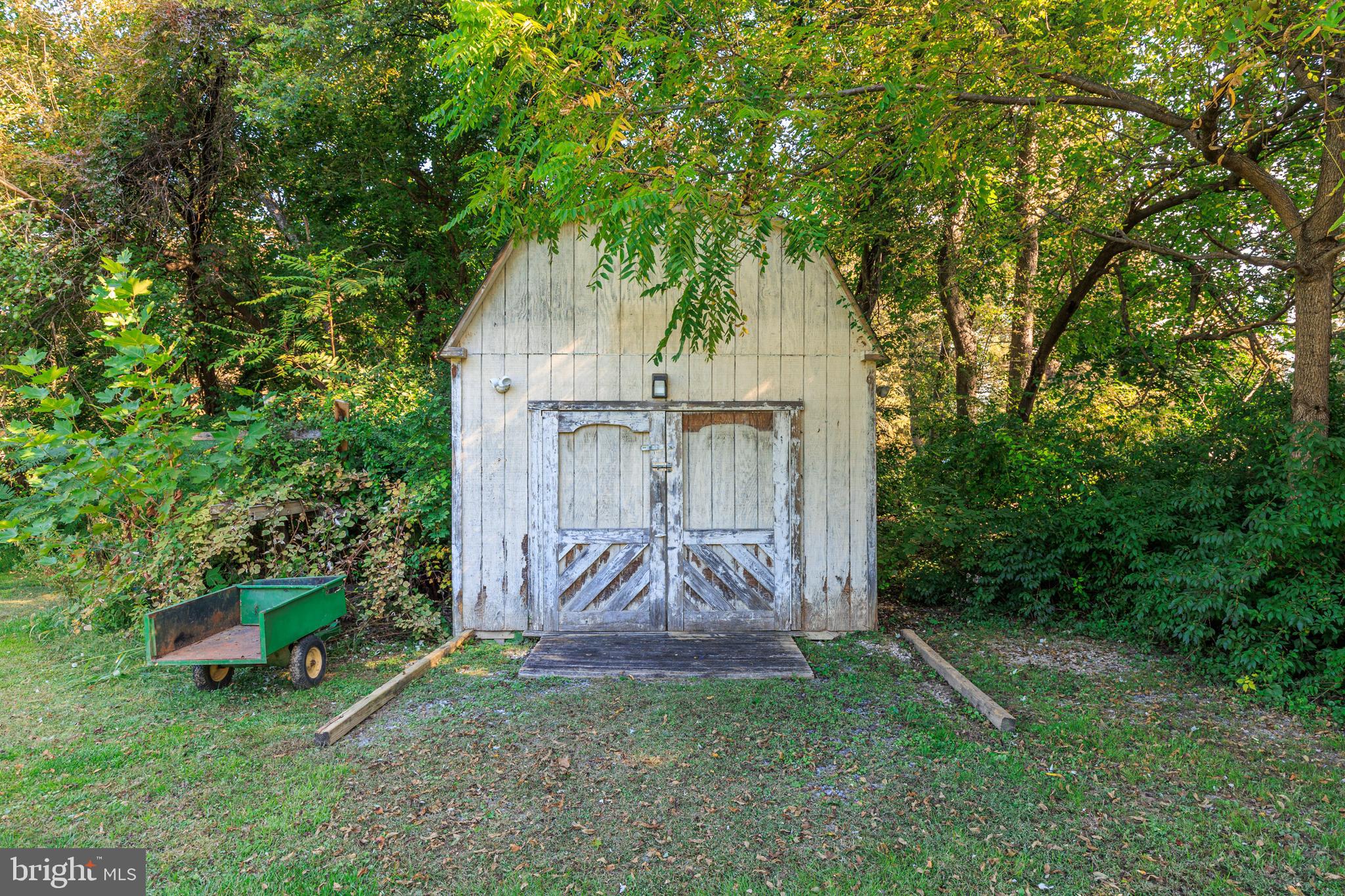15902 Trenton Road Upperco, MD 21155 - Photo 54 of 57 a view of backyard with a barn and large trees