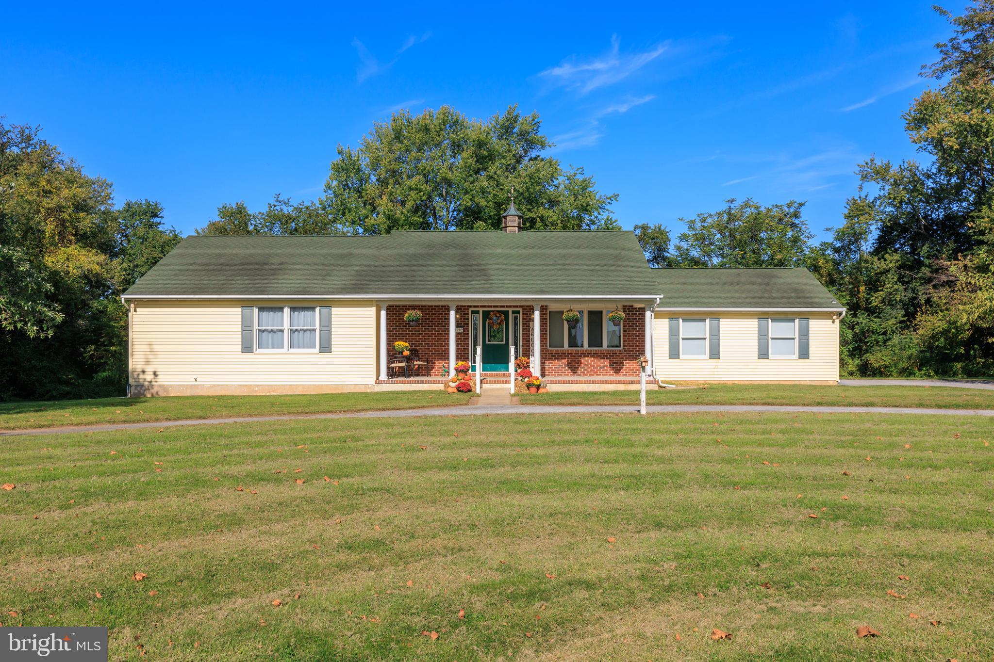 15902 Trenton Road Upperco, MD 21155 - Photo 56 of 57 a front view of a house with a garden