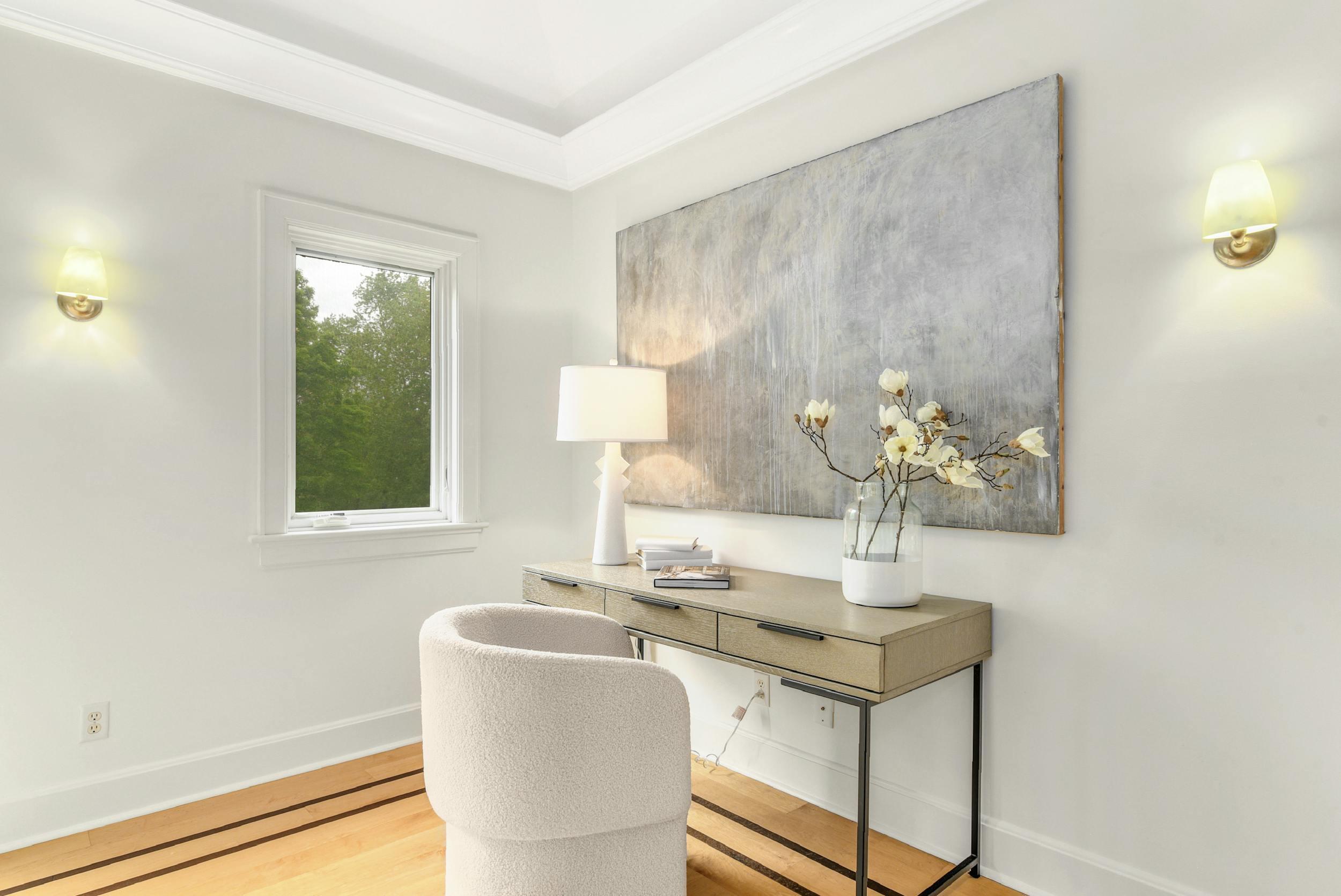 1315 Smith Ridge Road New Canaan, CT 06840 - Photo 25 of 54 a view of a dining room with a table and chairs