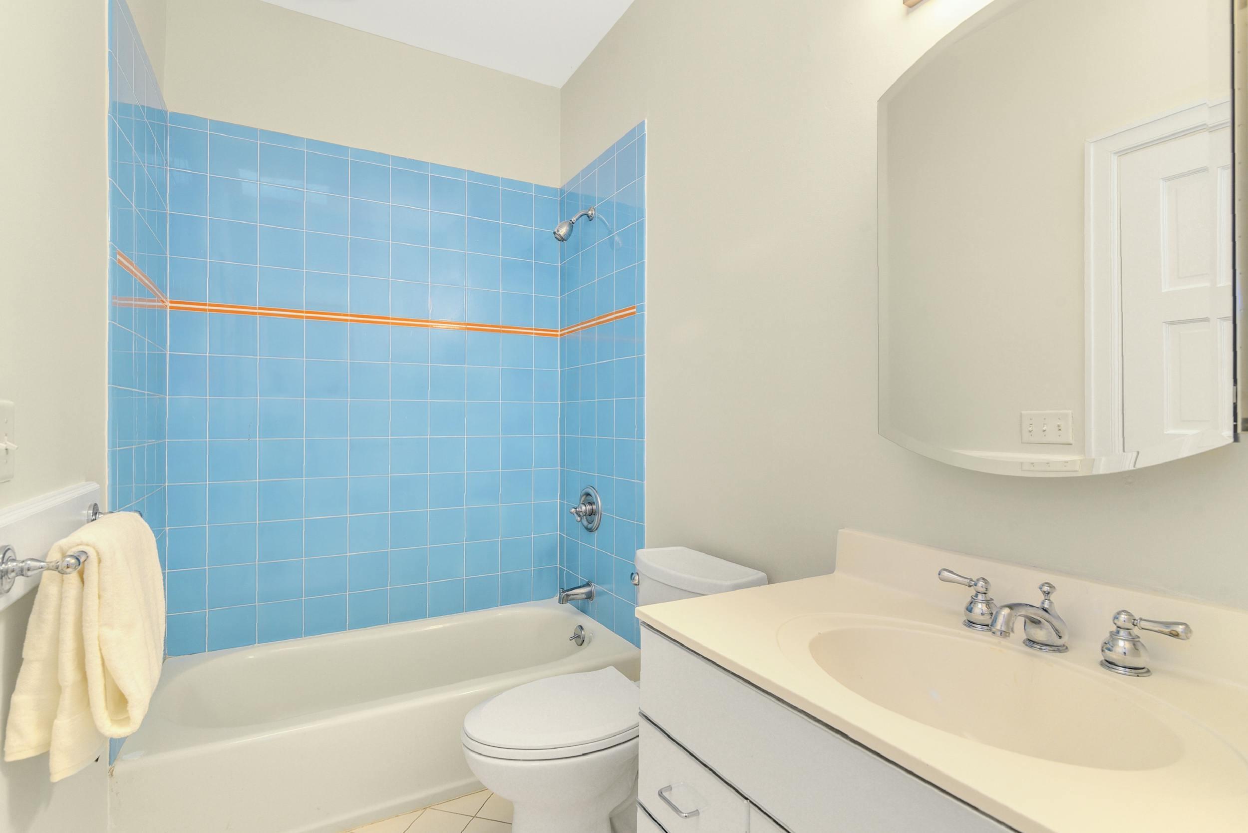 1315 Smith Ridge Road New Canaan, CT 06840 - Photo 30 of 54 a bathroom with a sink and a bathtub