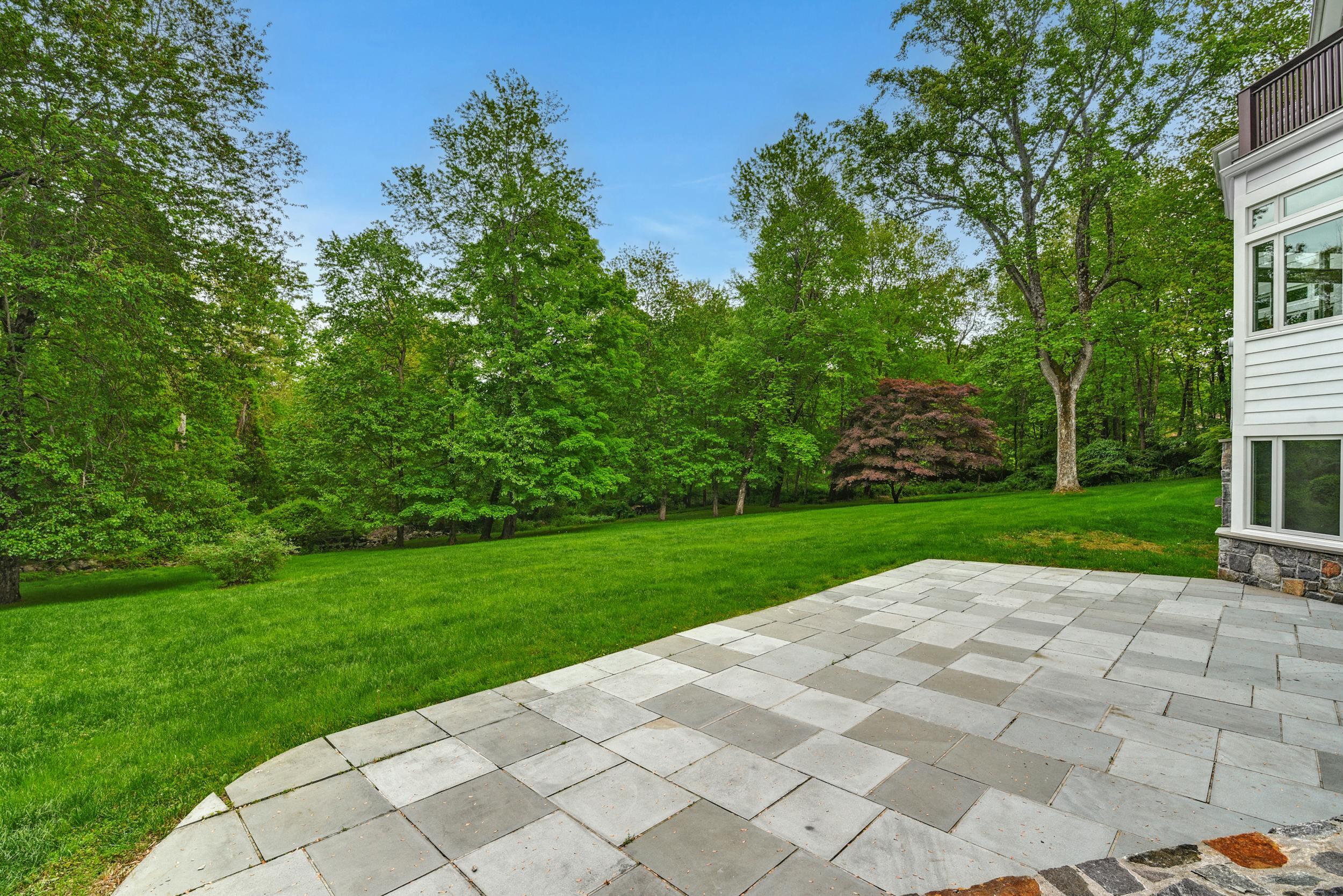 1315 Smith Ridge Road New Canaan, CT 06840 - Photo 45 of 54 a view of a park with plants and trees