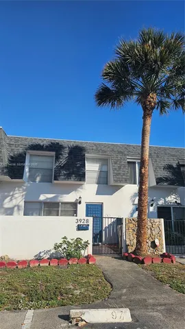 a view of a street with a house