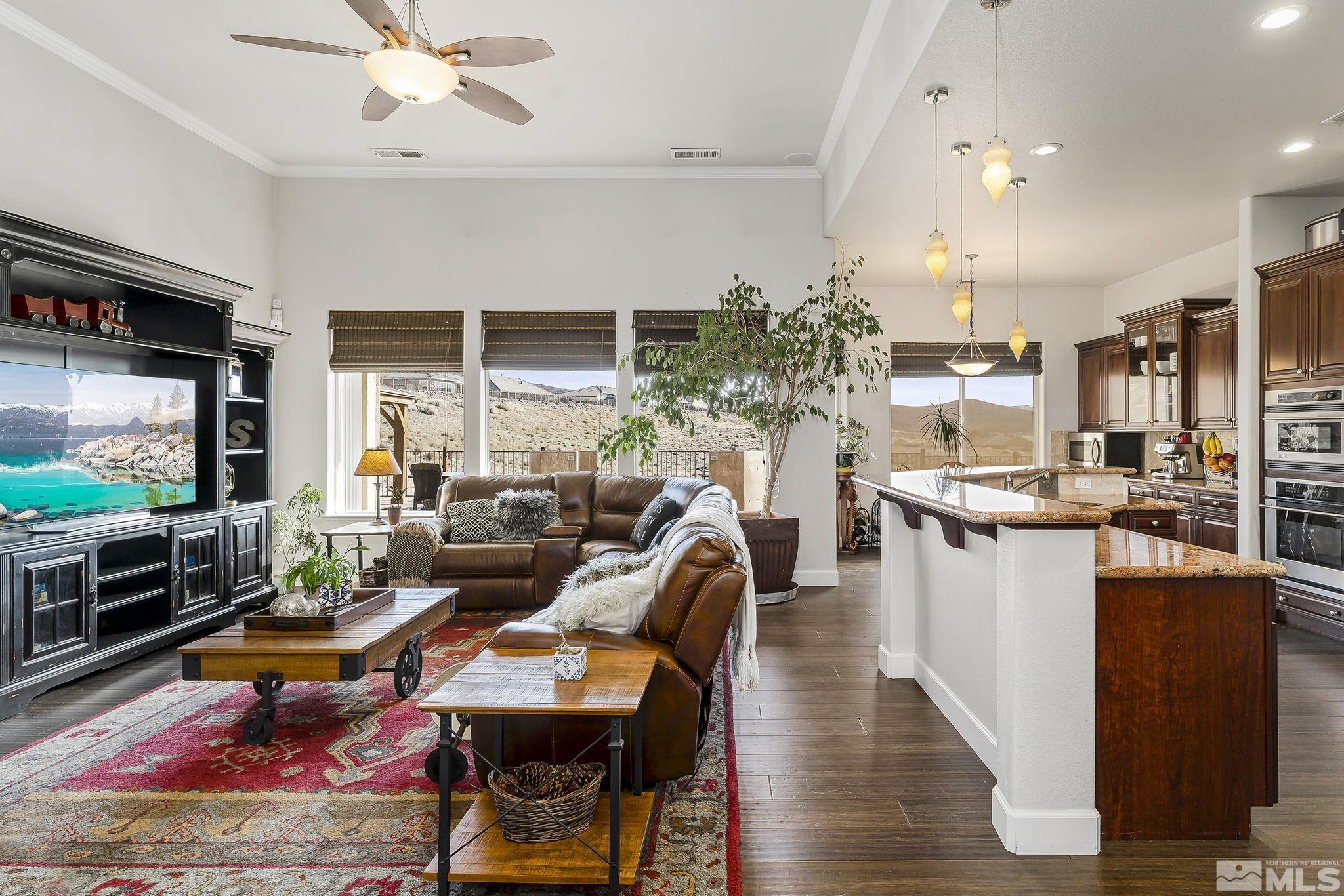 3528 Desert Fox Drive Sparks, NV 89436 - Photo 2 of 35 a living room with furniture and a flat screen tv