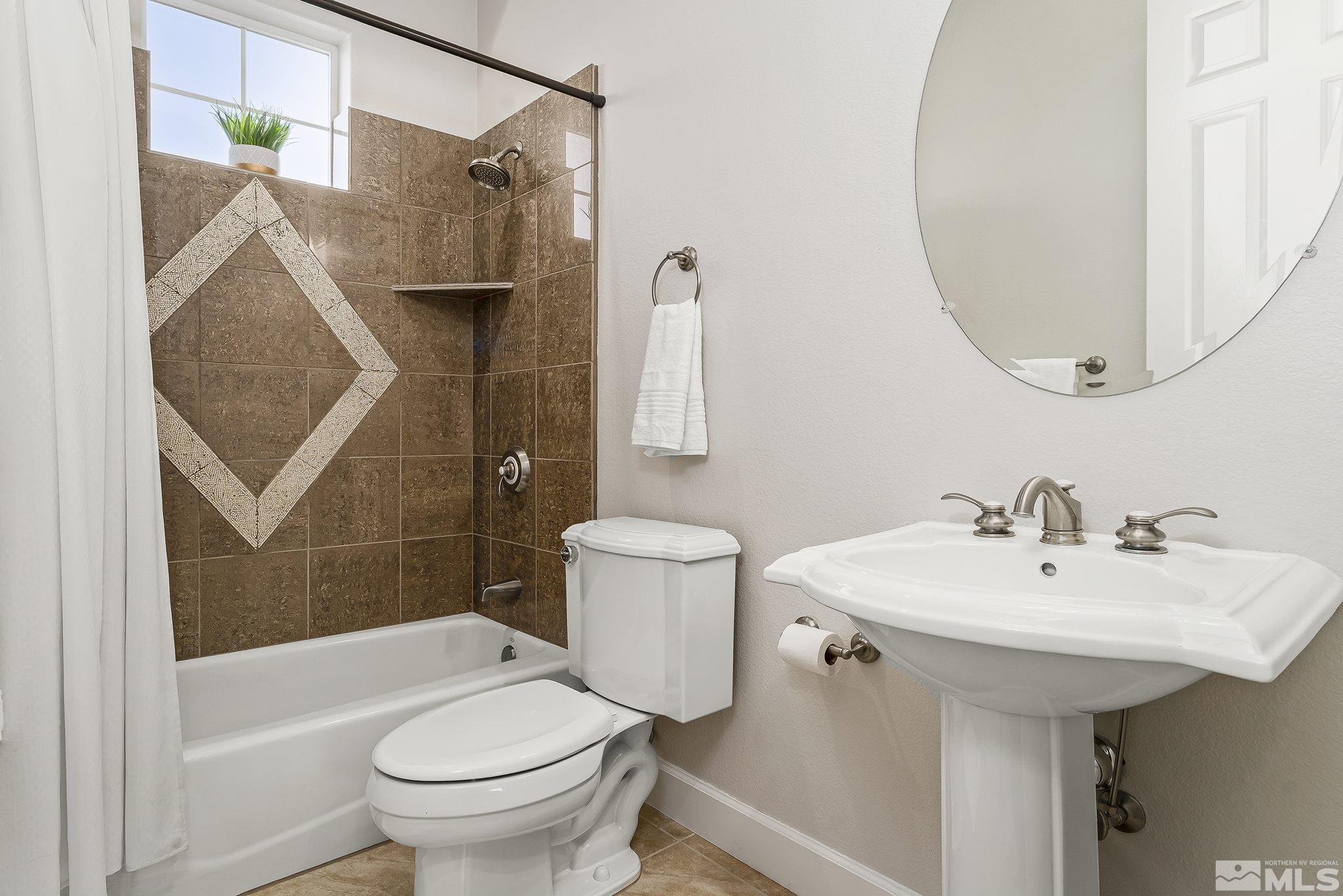 3528 Desert Fox Drive Sparks, NV 89436 - Photo 24 of 35 a bathroom with a sink toilet and shower