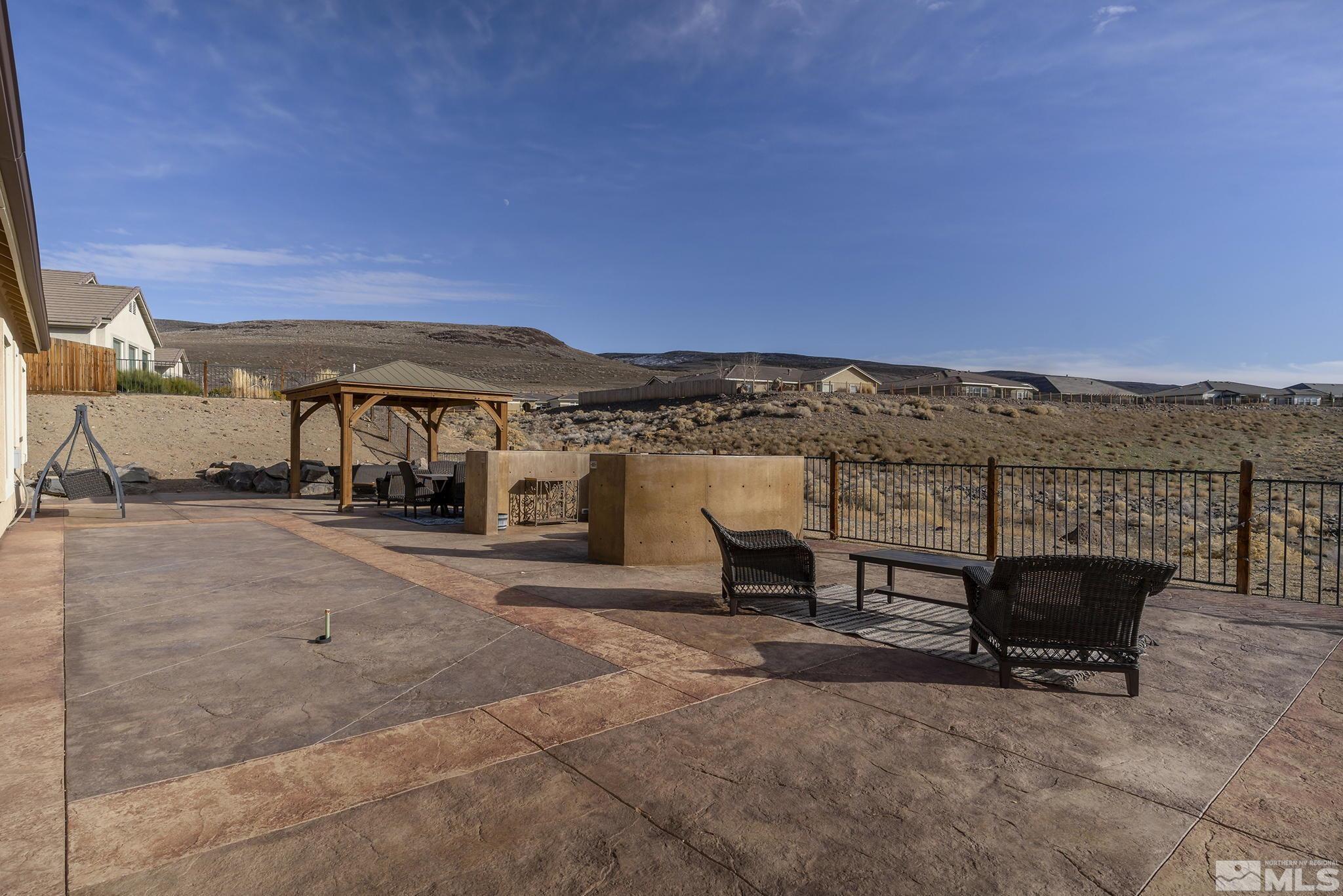 3528 Desert Fox Drive Sparks, NV 89436 - Photo 27 of 35 a view of a terrace with a bench