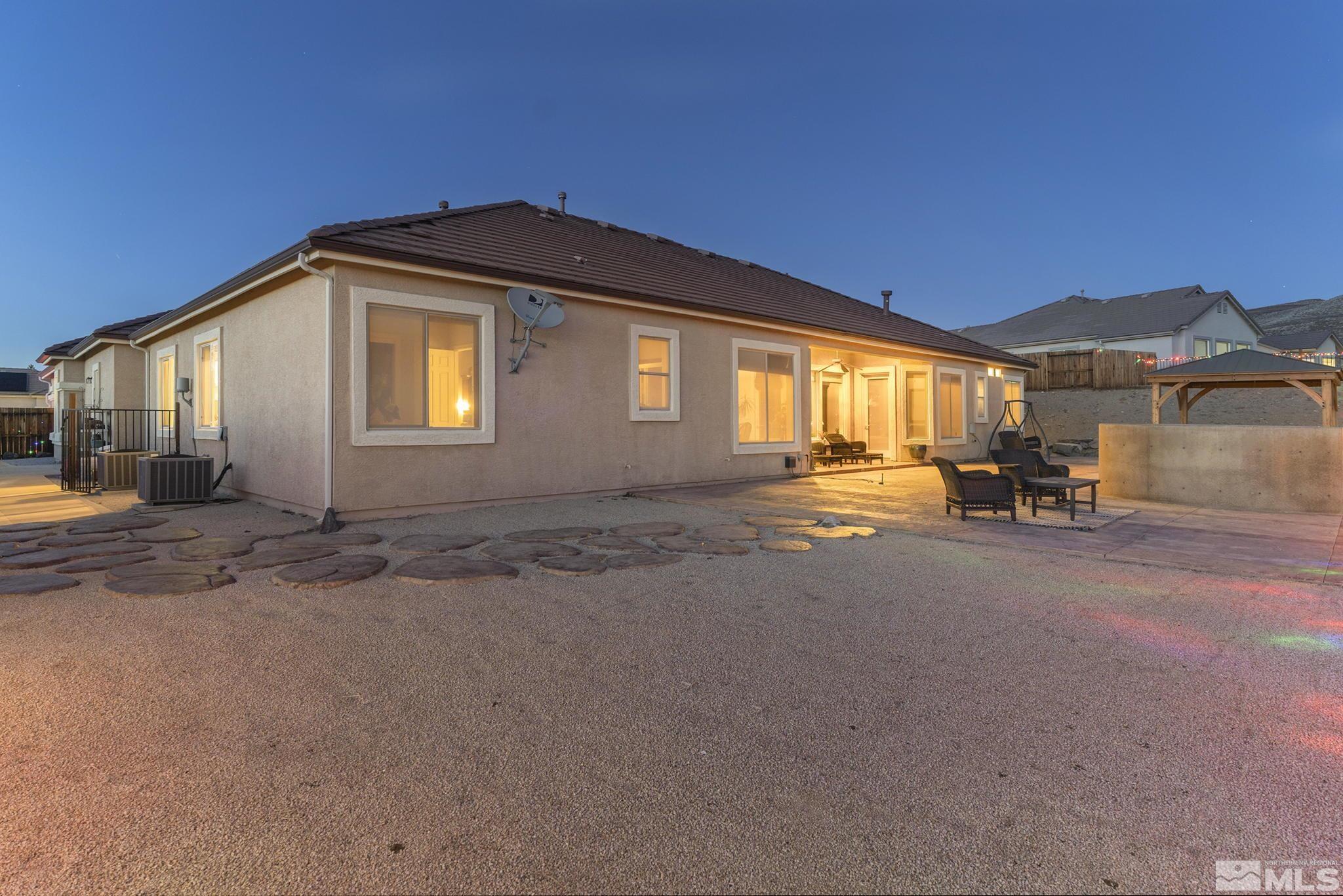 3528 Desert Fox Drive Sparks, NV 89436 - Photo 30 of 35 a front view of a house with a yard