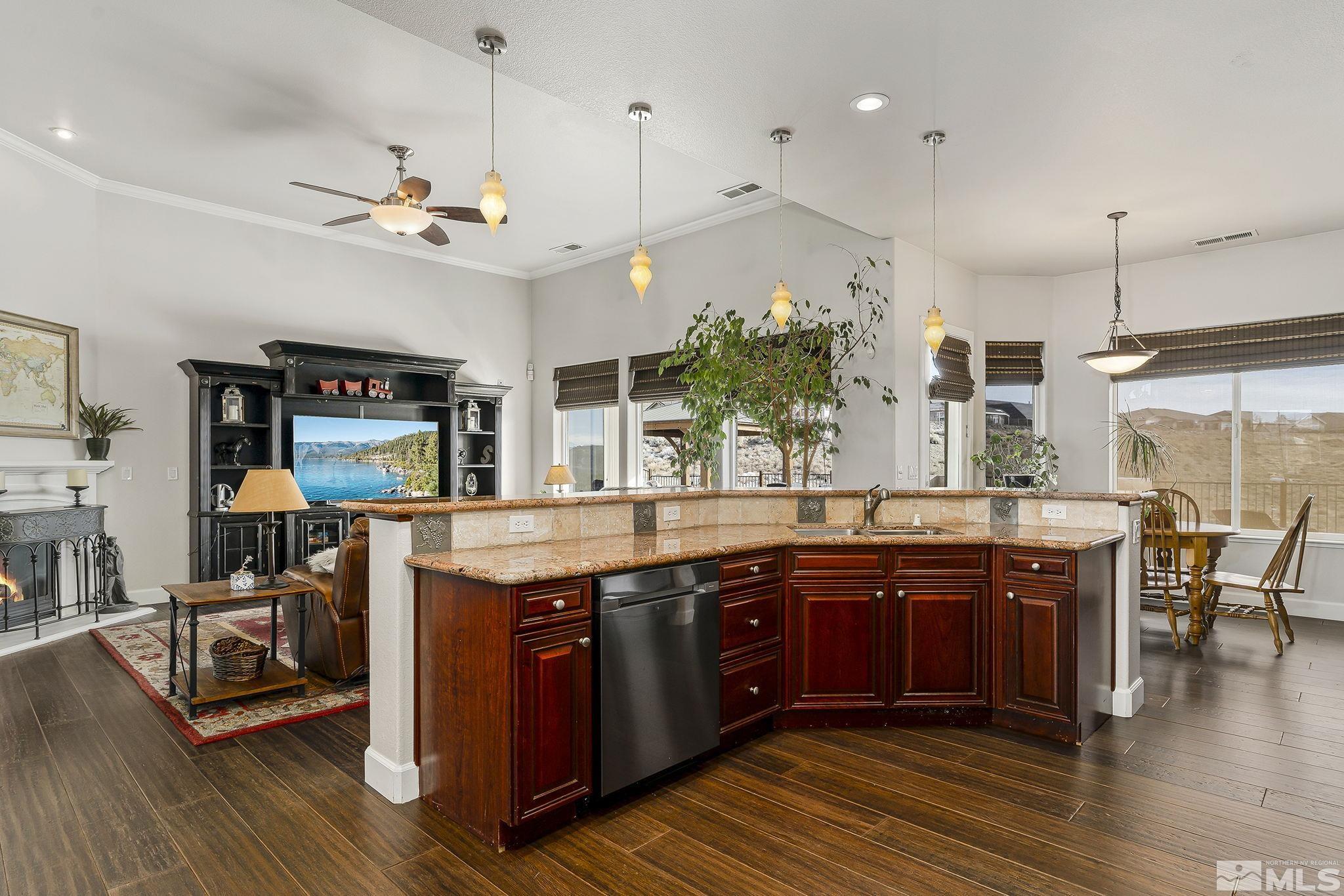 3528 Desert Fox Drive Sparks, NV 89436 - Photo 9 of 35 a large kitchen with lots of counter space a sink and appliances