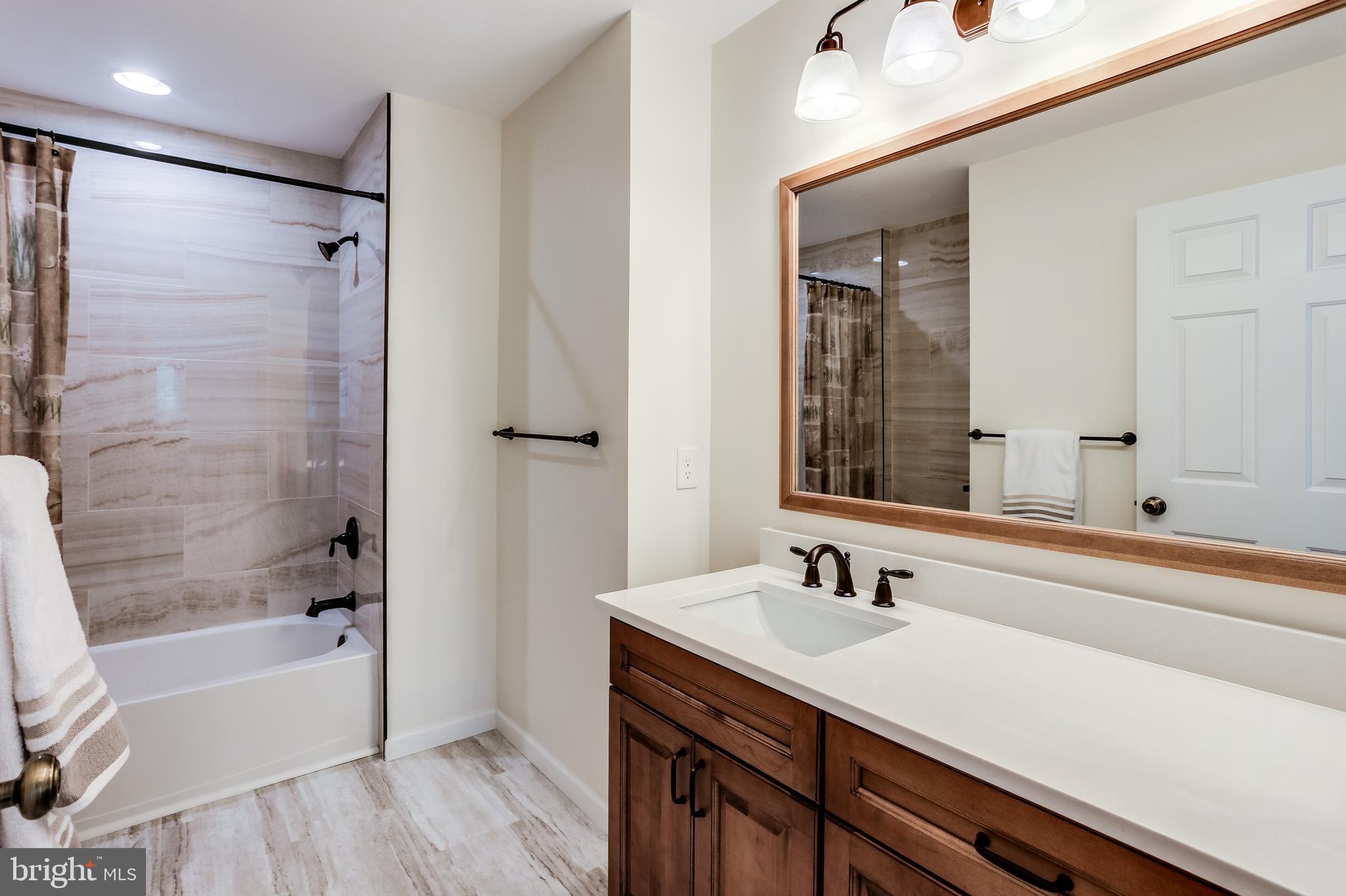 11208 Chaucers Ridge Court Laurel, MD 20723 - Photo 26 of 32 Upper level full bathroom remodel 2021