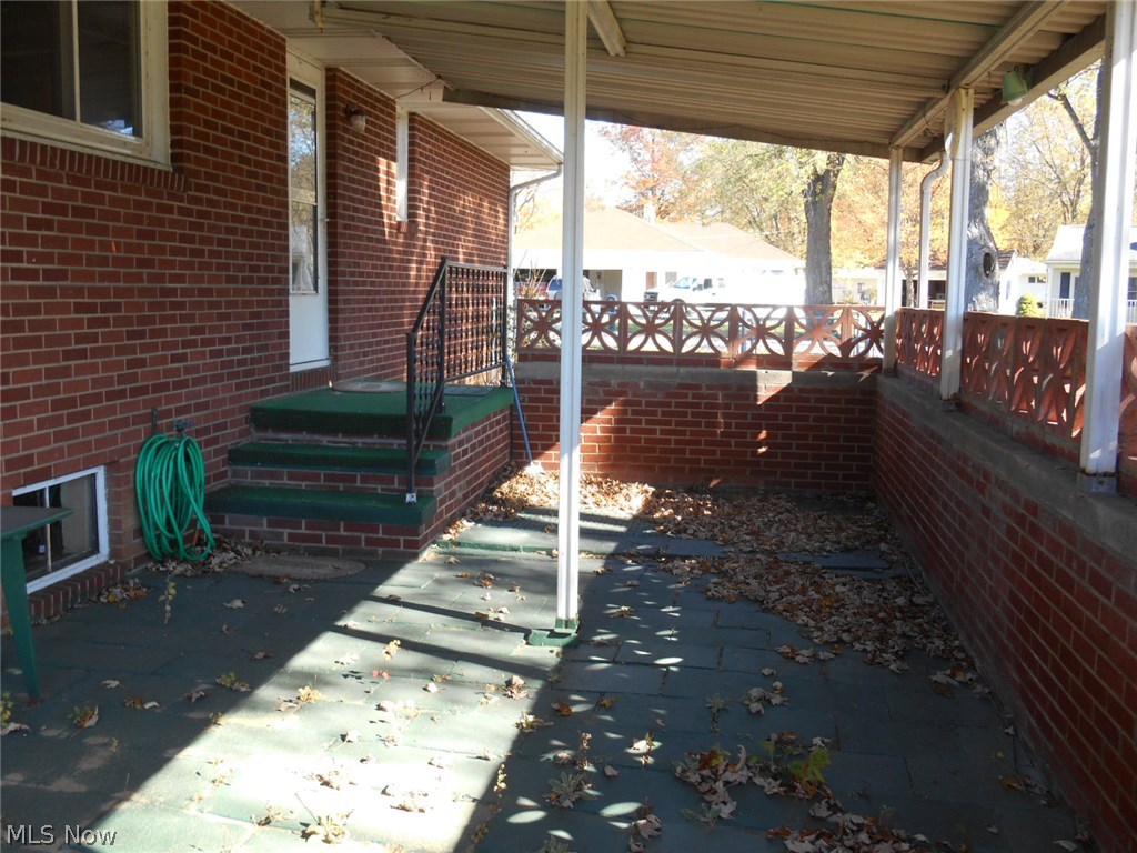 3206 Lake Road West Ashtabula, OH 44004 - Photo 7 of 25 COVERED BACK PATIO