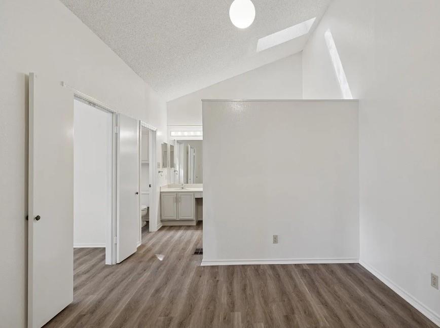 531 Ranch Trail, Unit 157 Irving, TX 75063 - Photo 20 of 21 a view of empty room with wooden floor