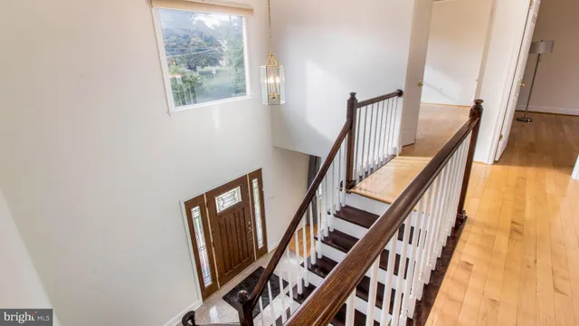 a view of an entryway with wooden floor