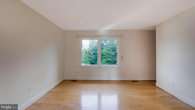 an empty room with a window