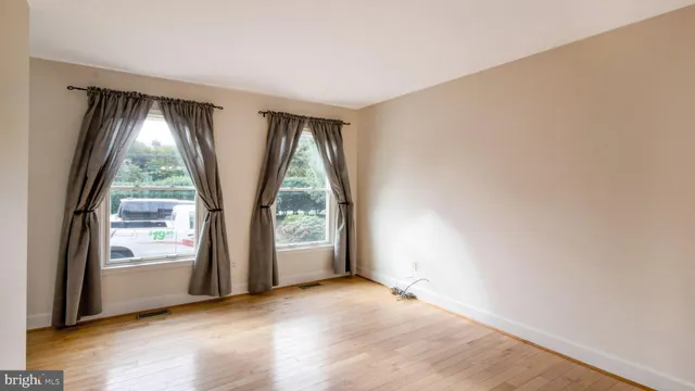 an empty room with windows