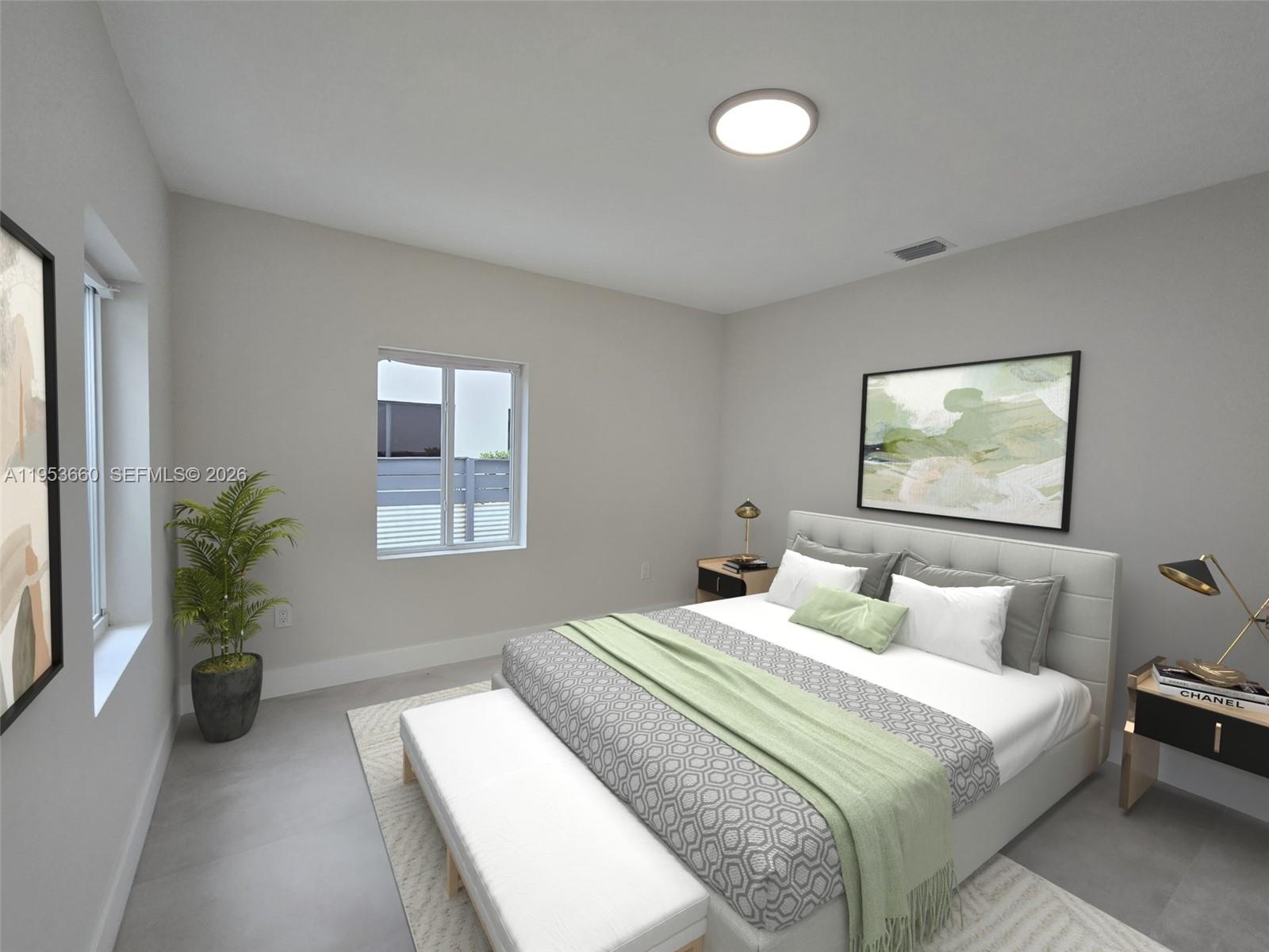 765 Northwest 45th Street Miami, FL 33127 - Photo 24 of 46 a bedroom with bed and window