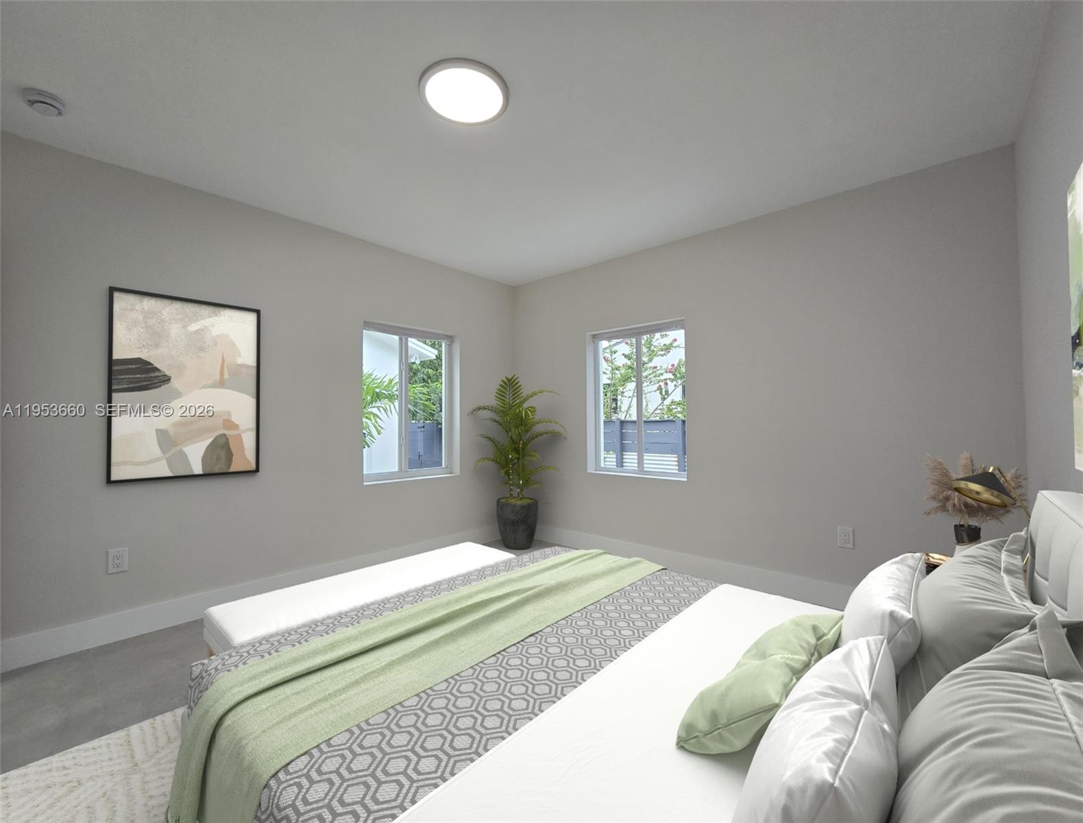 765 Northwest 45th Street Miami, FL 33127 - Photo 27 of 46 a bedroom with a bed and a window