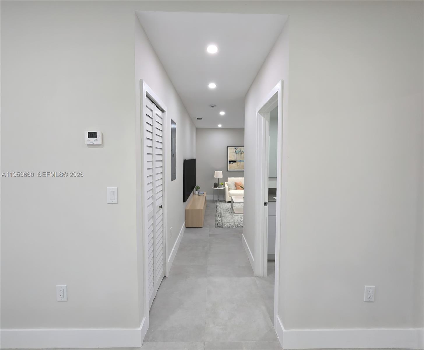 765 Northwest 45th Street Miami, FL 33127 - Photo 28 of 46 a view of a hallway with dining area