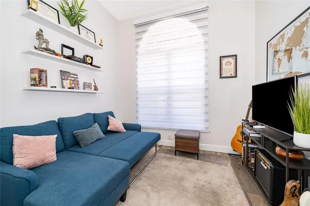 a backyard of a house with a garden and plants