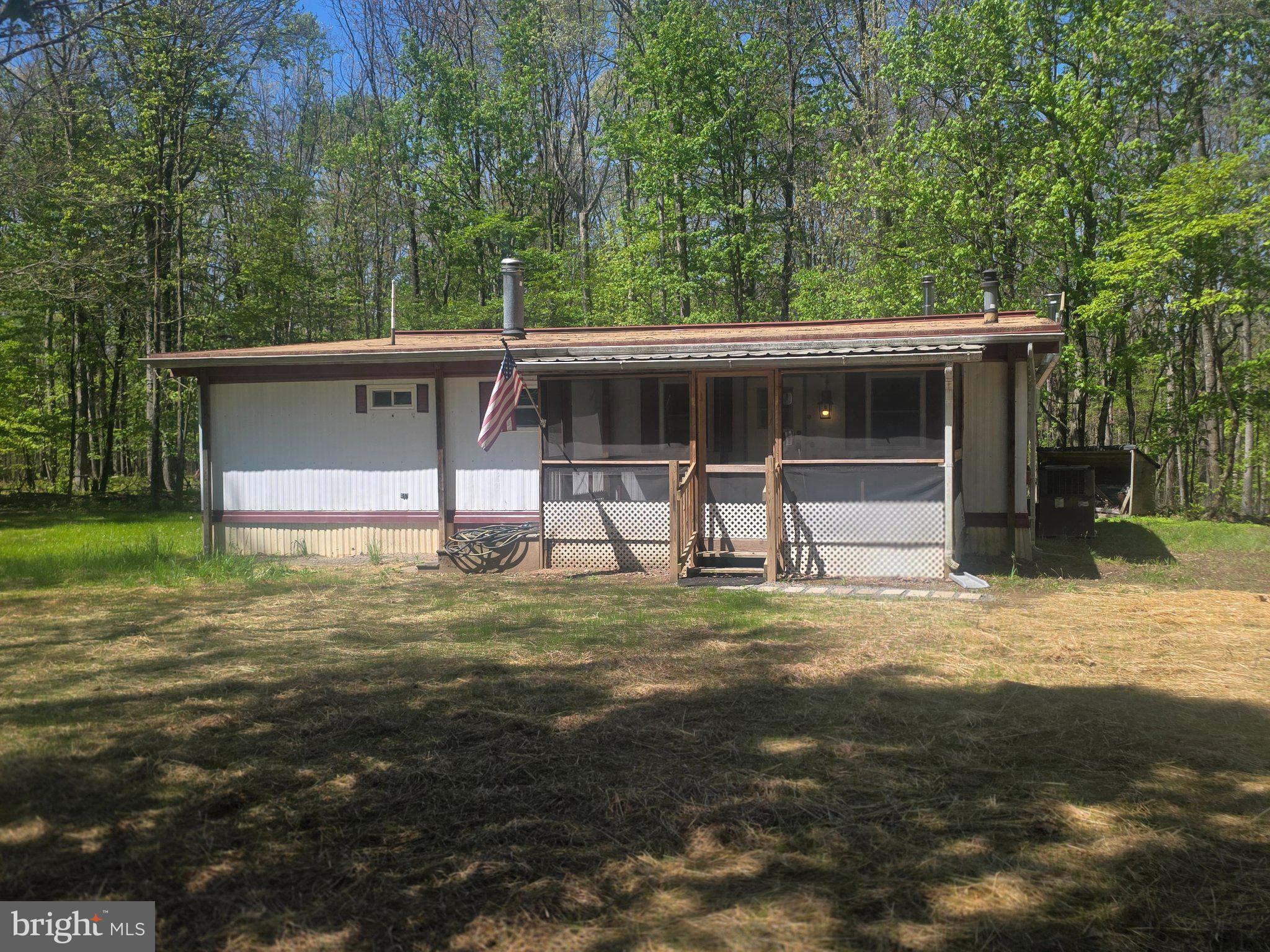 357 Gunsmoke Road Warfordsburg, PA 17267 - Photo 1 of 23 Charming retreat nestled in nature.