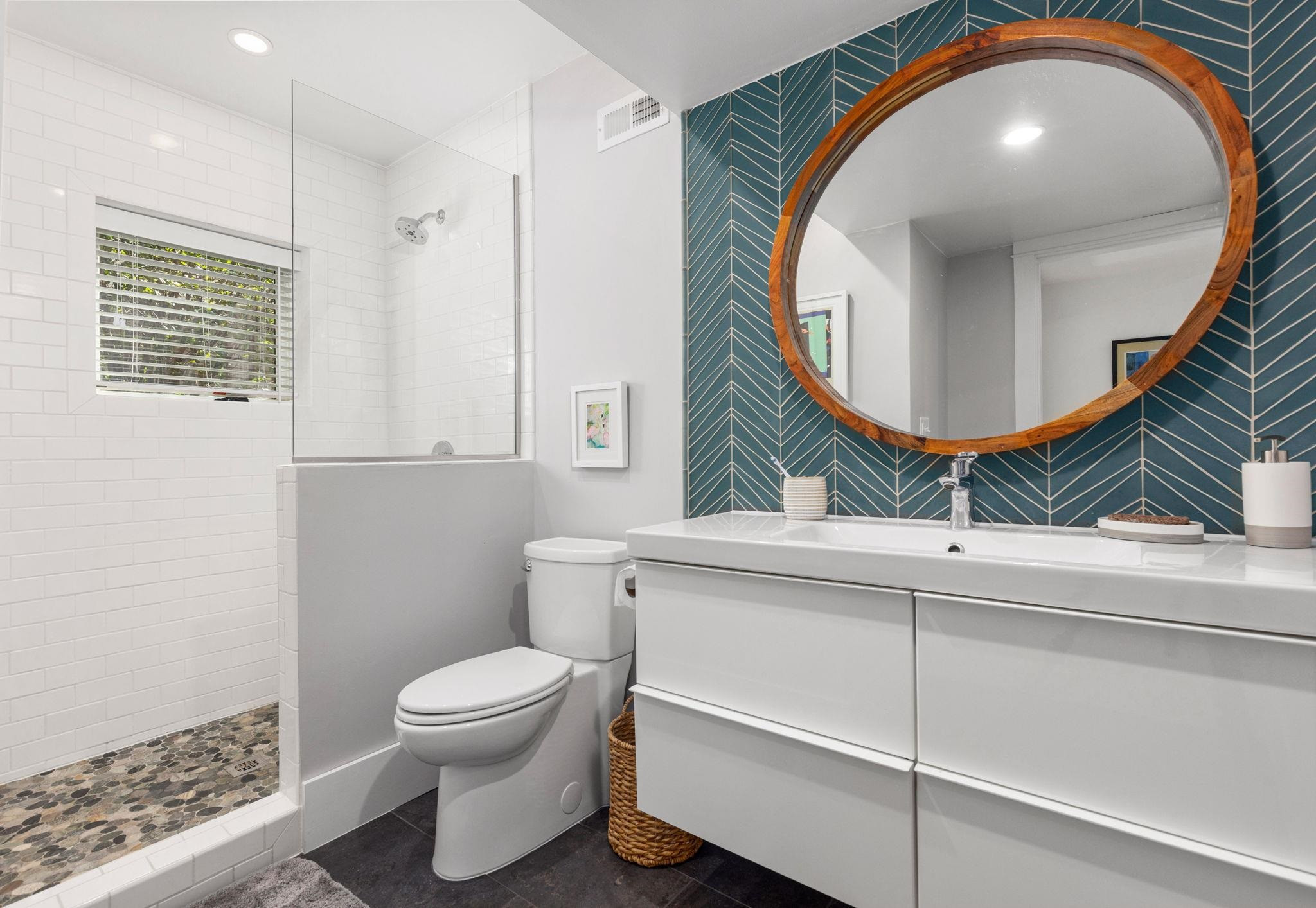 1610 Bickett Boulevard Raleigh, NC 27608 - Photo 12 of 44 a bathroom with a toilet and a sink