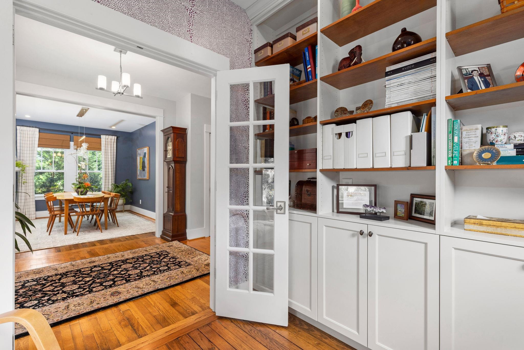 1610 Bickett Boulevard Raleigh, NC 27608 - Photo 15 of 44 a kitchen with stainless steel appliances granite countertop a refrigerator and a stove top oven