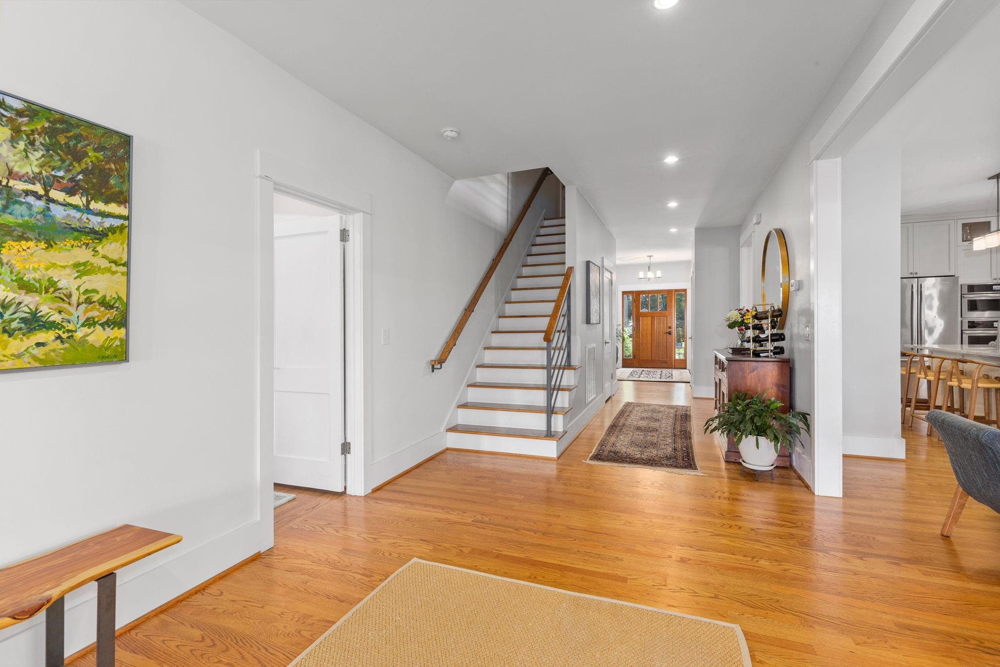 1610 Bickett Boulevard Raleigh, NC 27608 - Photo 24 of 44 a view of entryway and hall with wooden floor