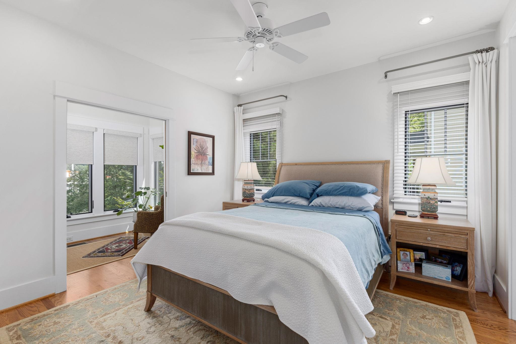 1610 Bickett Boulevard Raleigh, NC 27608 - Photo 25 of 44 a spacious bedroom with a bed and a large window