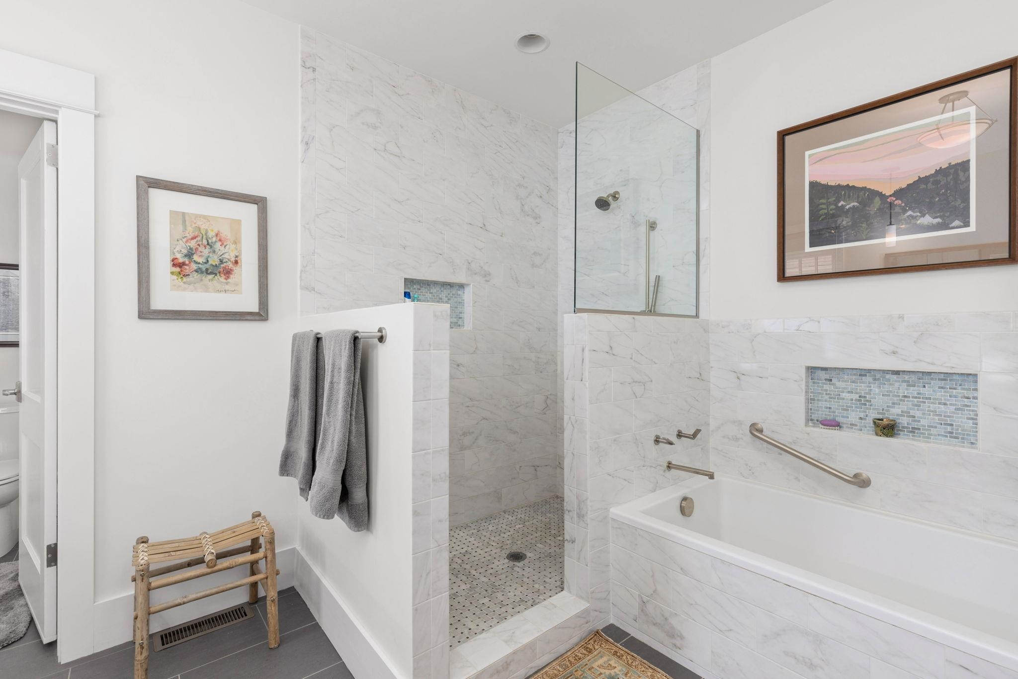 1610 Bickett Boulevard Raleigh, NC 27608 - Photo 27 of 44 a bathroom with a tub and a shower