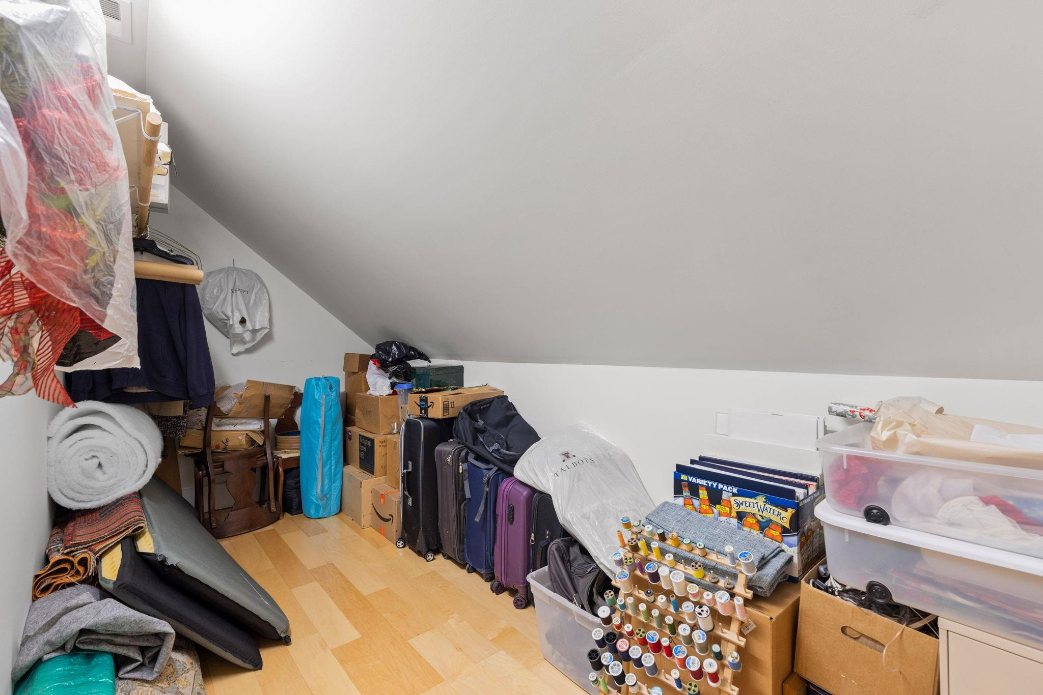 1610 Bickett Boulevard Raleigh, NC 27608 - Photo 34 of 44 a view of a room with racks on the wall