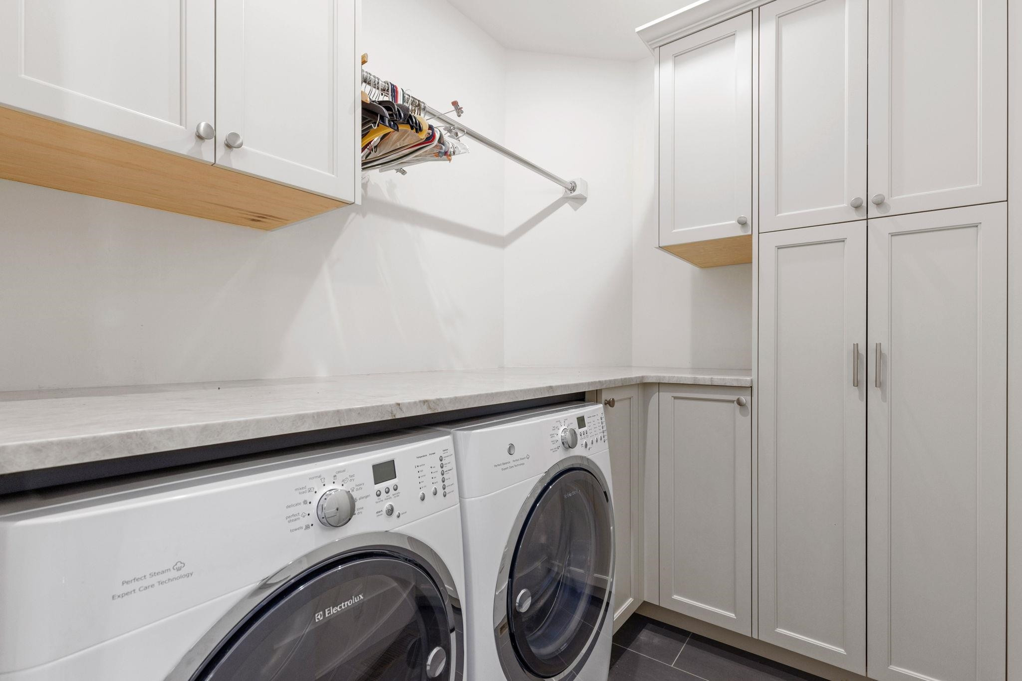 1610 Bickett Boulevard Raleigh, NC 27608 - Photo 43 of 44 a utility room with dryer and washer