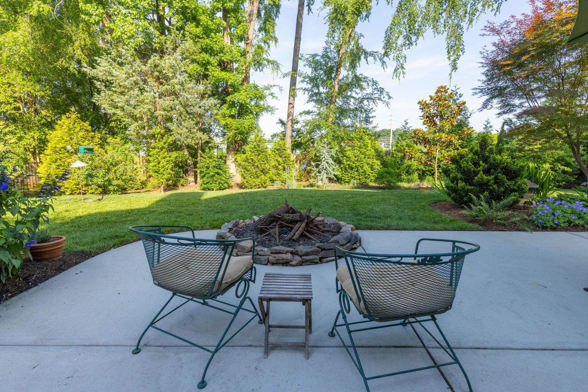 1610 Bickett Boulevard Raleigh, NC 27608 - Photo 7 of 44 a view of a backyard with sitting area