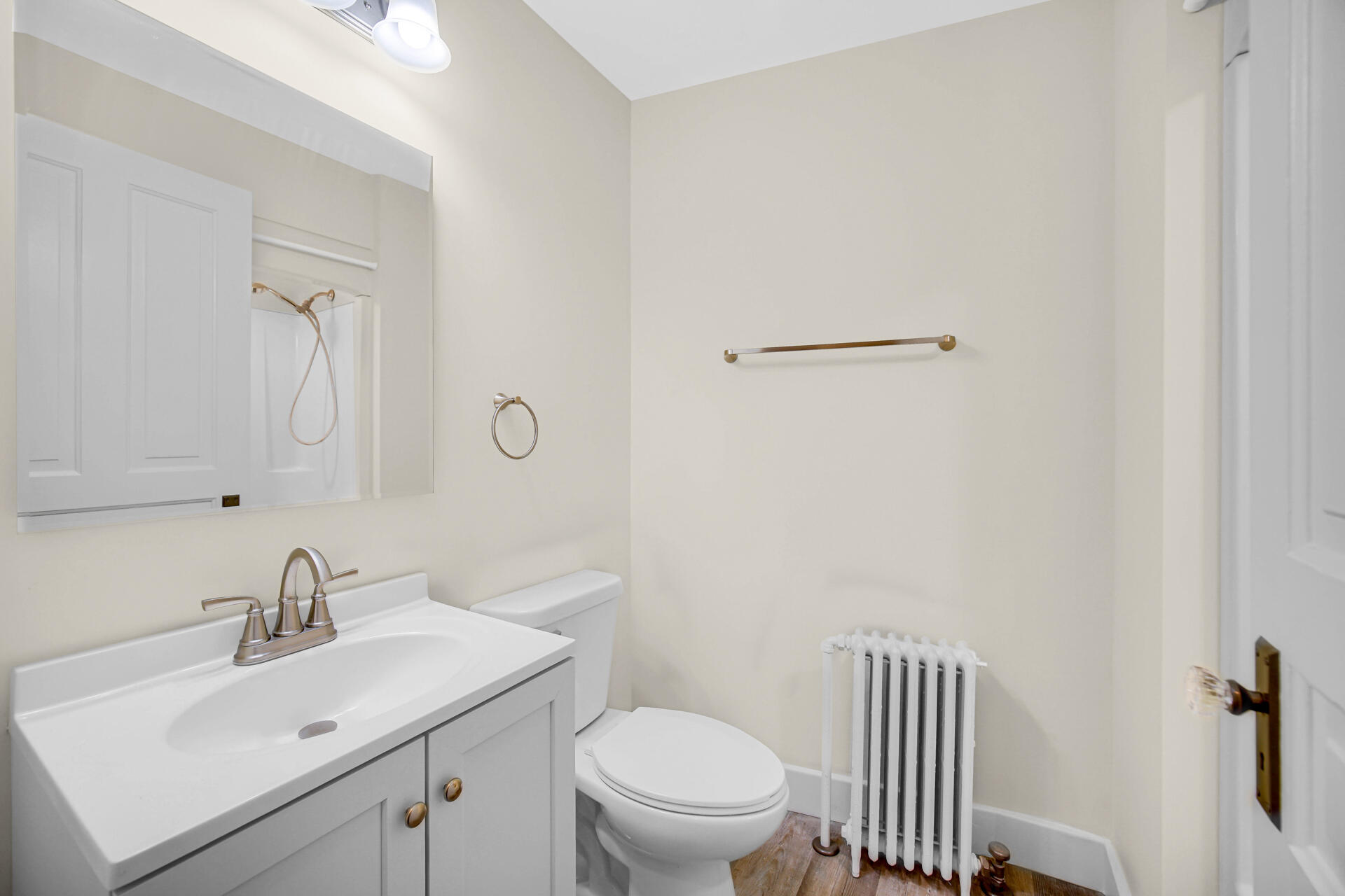 411 E Street La Porte, IN 46350 - Photo 20 of 33 a bathroom with a sink toilet and a mirror