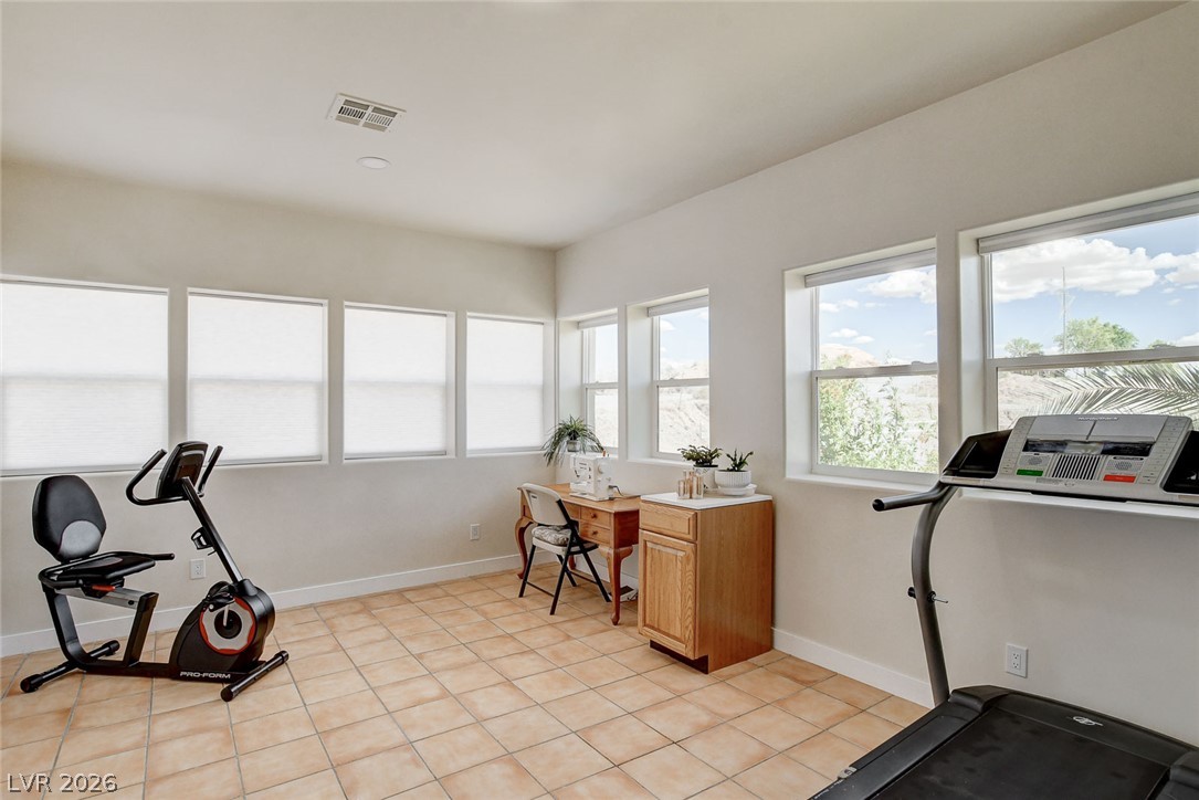 1950 Bowman Road Logandale, NV 89021 - Photo 34 of 81 Well-lit room offers versatility for exercise or creative pursuits.