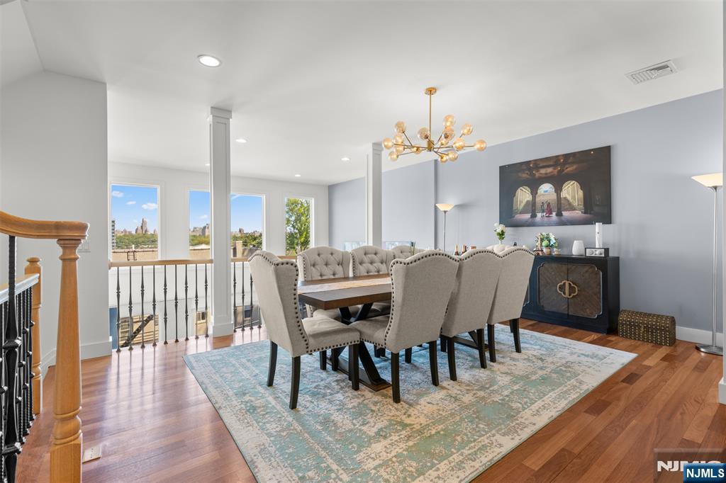 7 Oakdene Terrace, Unit 7 Edgewater, NJ 07020 - Photo 10 of 30 a view of a a dining room with furniture window and wooden floor