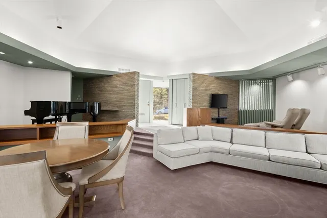 a living room with furniture and a couch