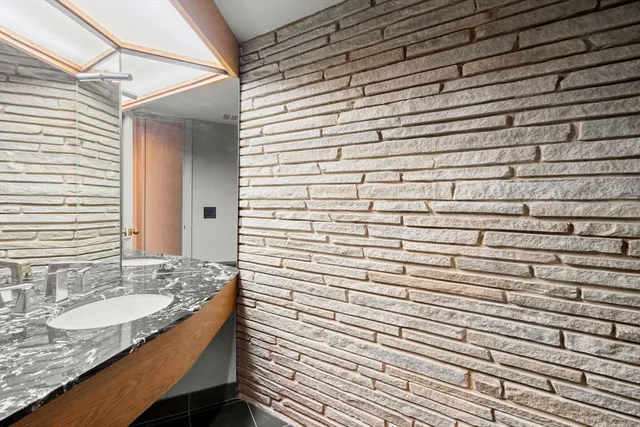 a view of a room with a large window