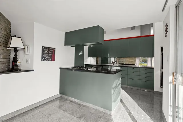 a bathroom with a sink a toilet and bathtub