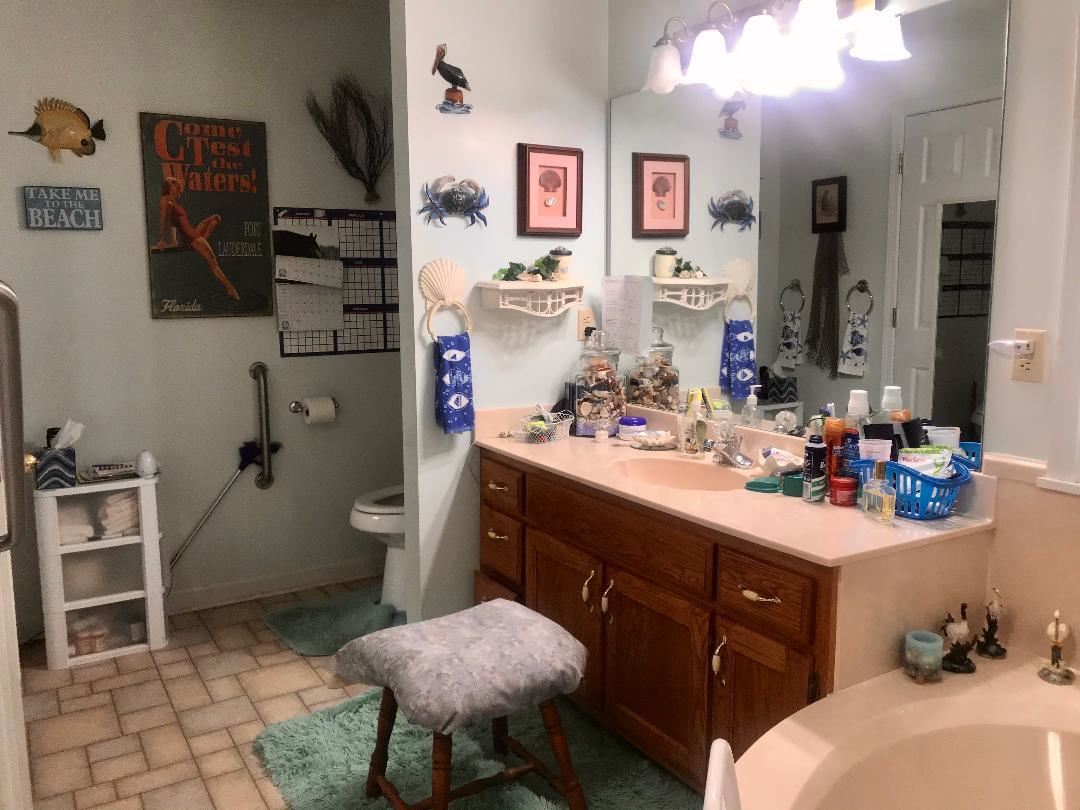 303 Pill Jerk Road Covington, TN 38019 - Photo 15 of 25 Has grab bars or handicap bars and big walk-in closet.