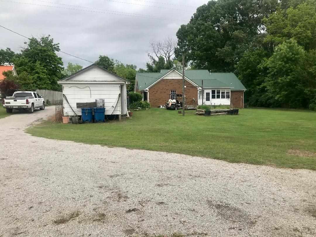 303 Pill Jerk Road Covington, TN 38019 - Photo 21 of 25 Covered Carport with Storage Area