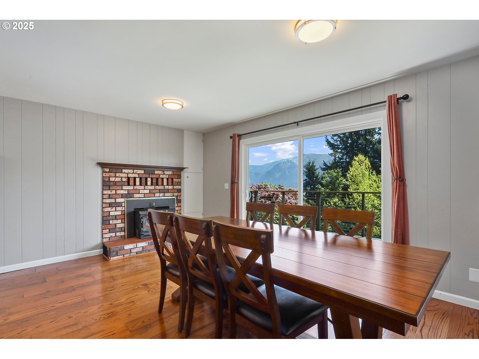 101 Allen Street Carson, WA 98610 - Photo 13 of 48 a view of a dining room with furniture window and wooden floor