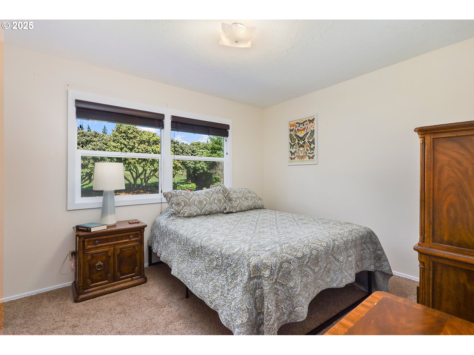 101 Allen Street Carson, WA 98610 - Photo 16 of 48 a bedroom with a bed and a window