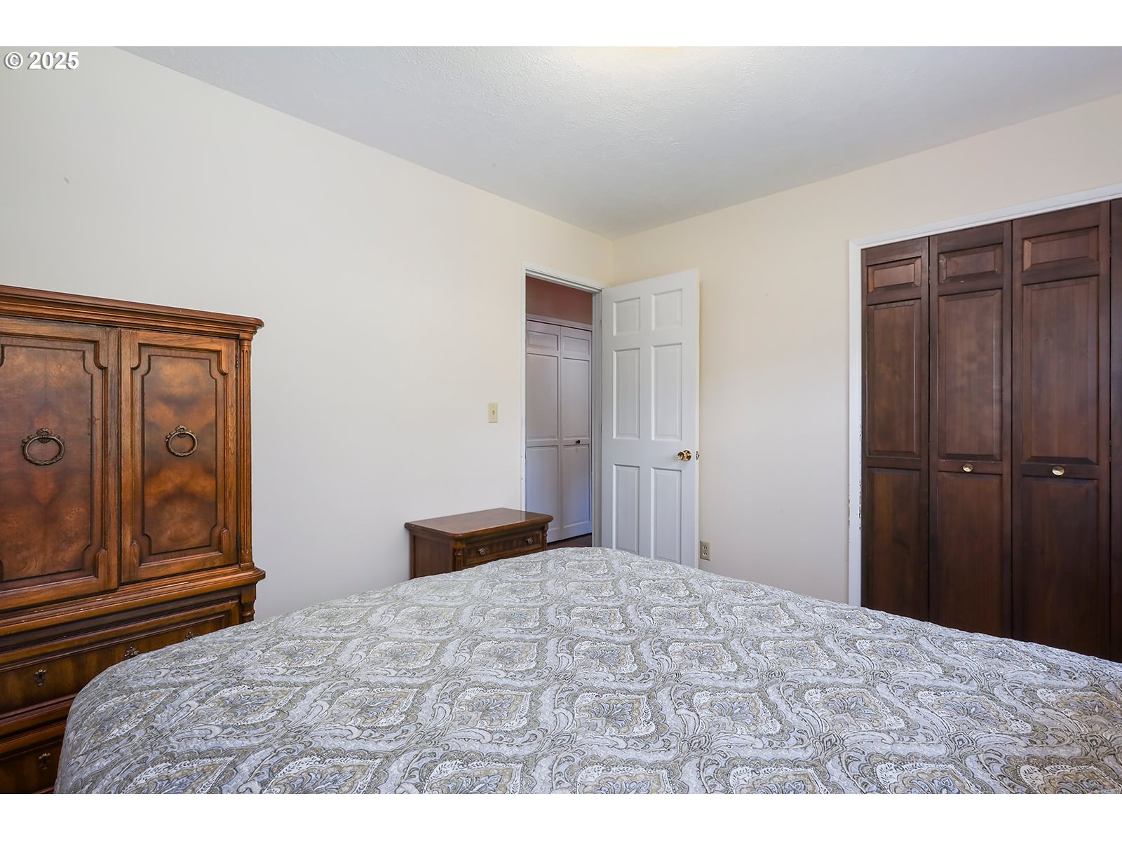 101 Allen Street Carson, WA 98610 - Photo 17 of 48 a bedroom with a bed and wooden floor